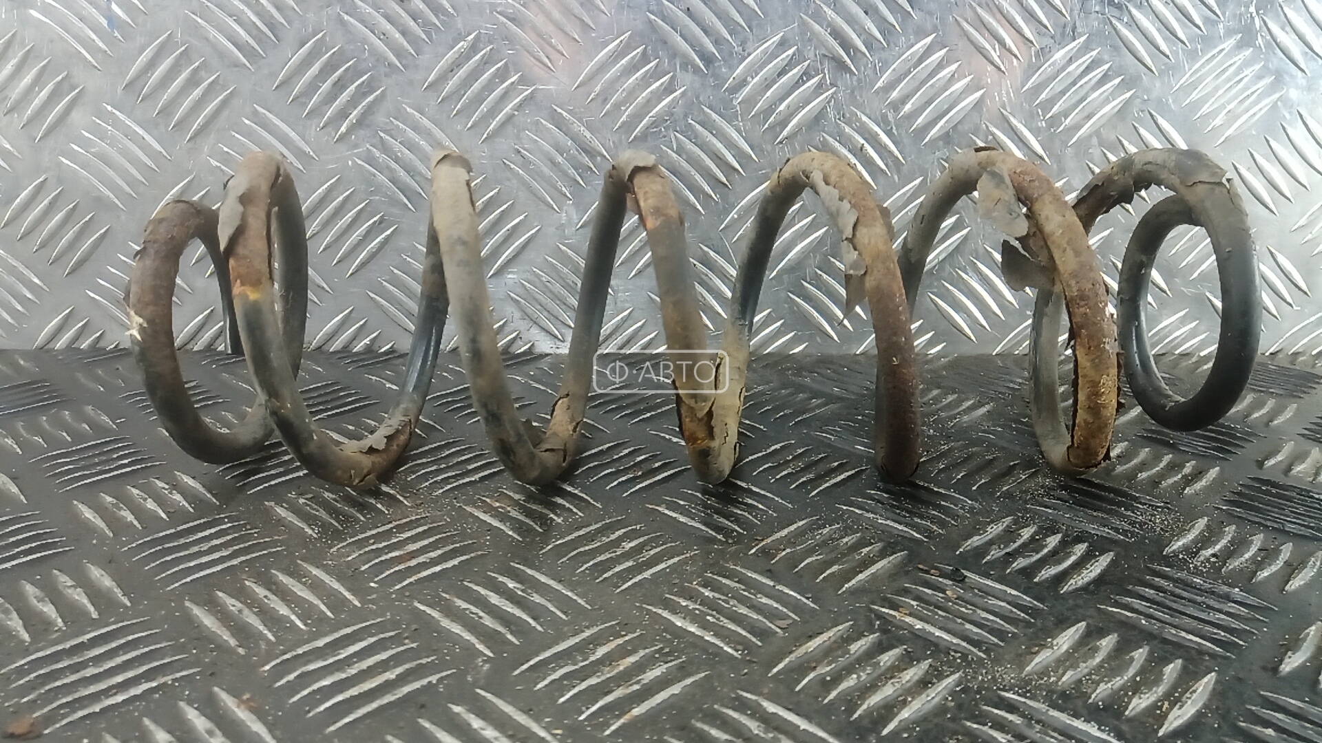 Пружина задняя