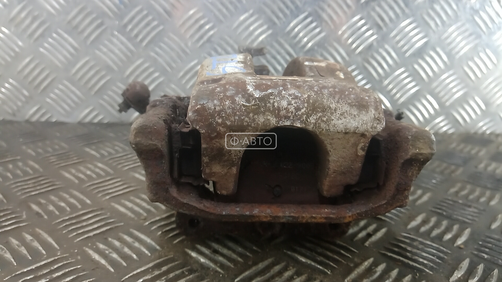 Суппорт тормозной задний левый