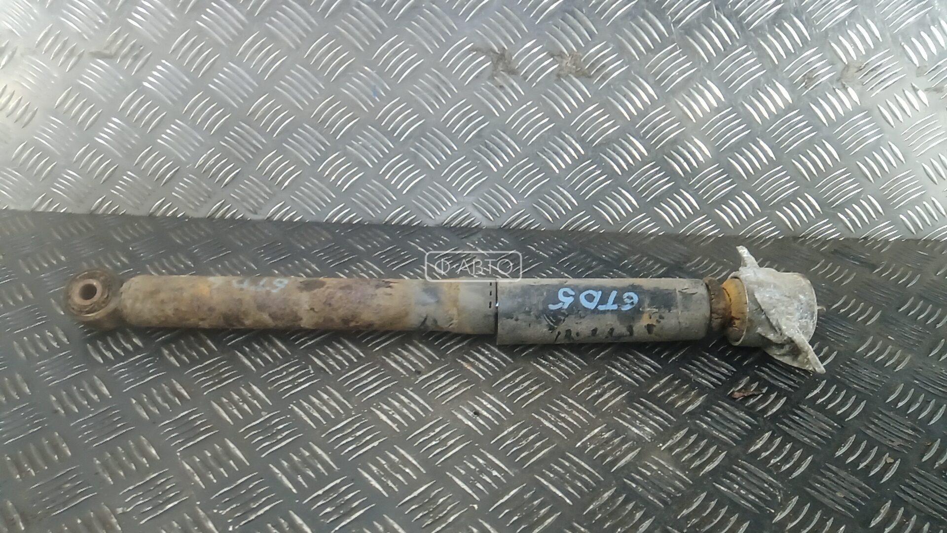 Амортизатор задней балки