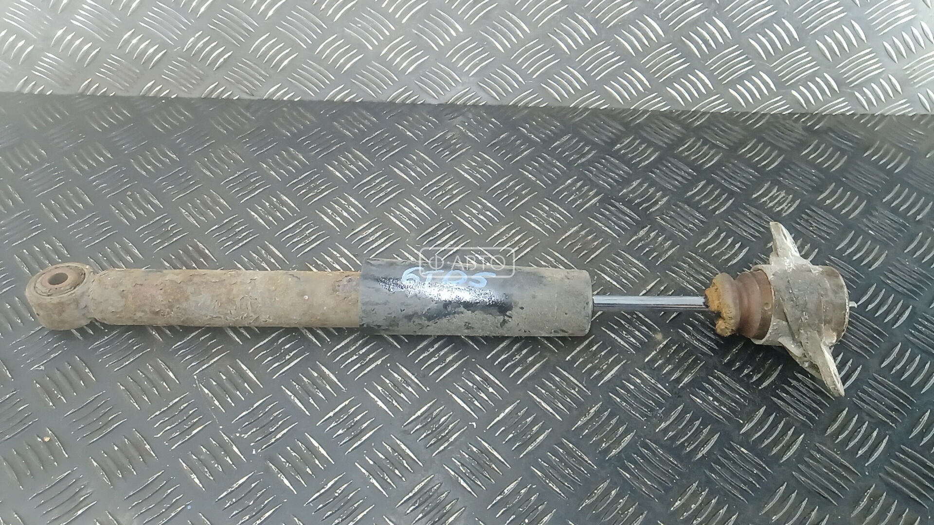 Амортизатор задней балки