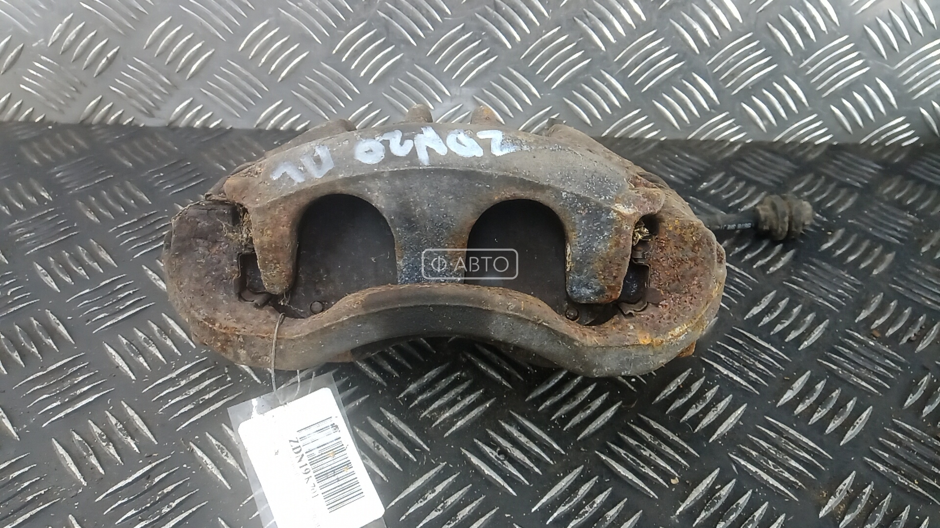 Суппорт тормозной передний левый