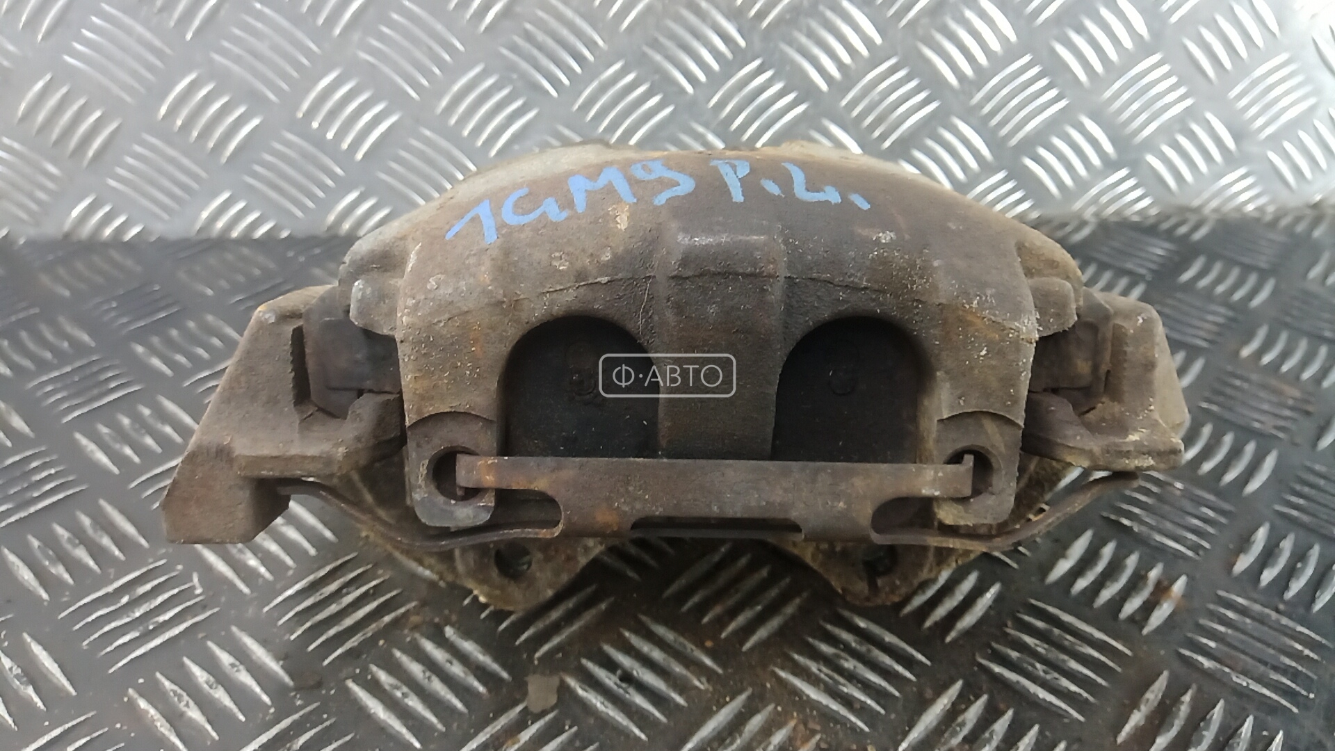 Суппорт тормозной передний левый