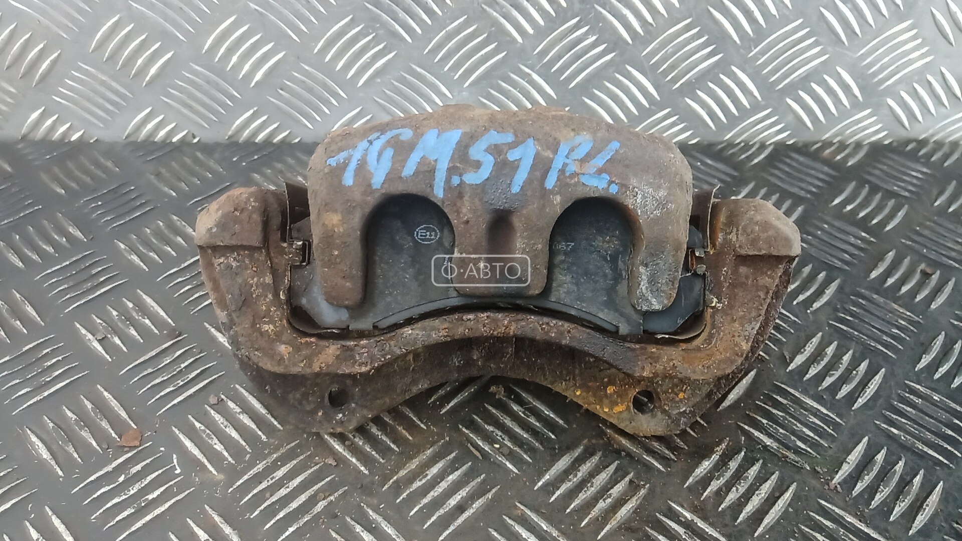 Суппорт тормозной передний левый