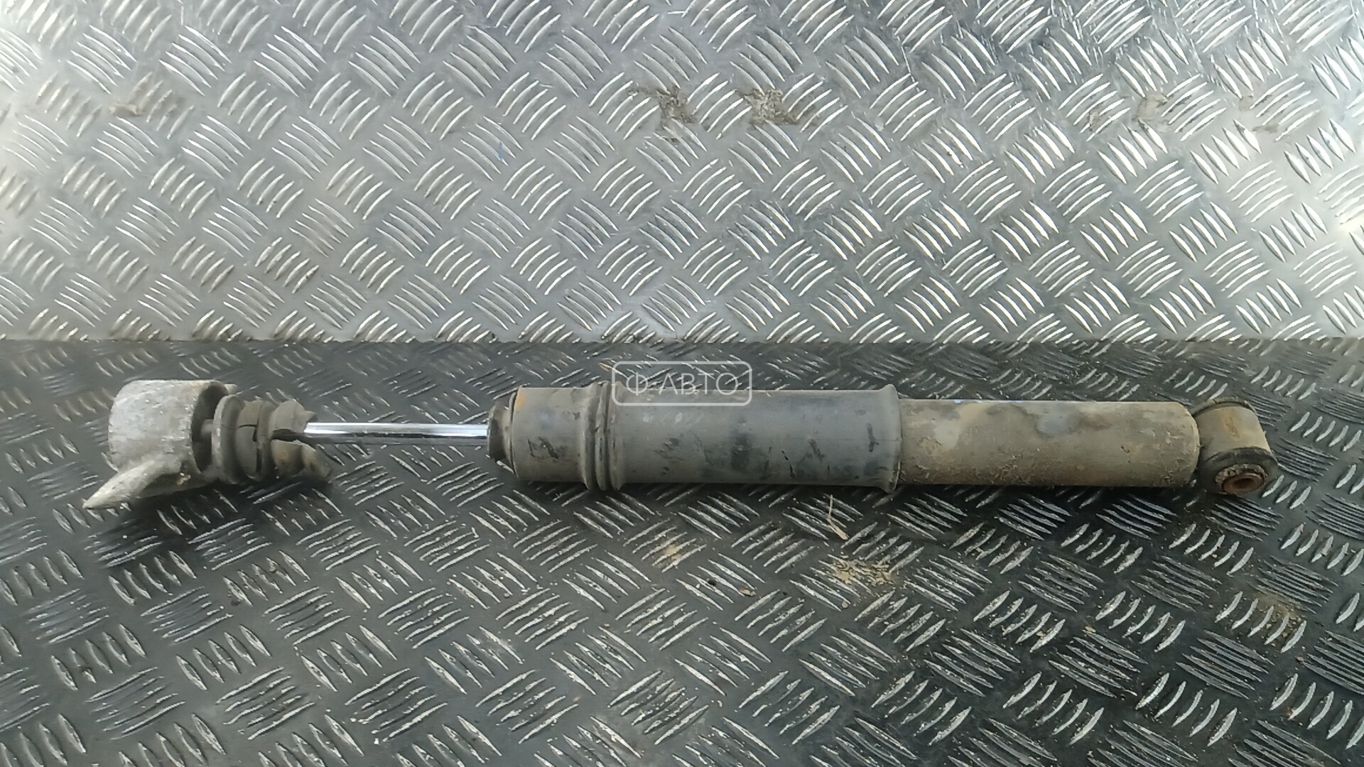 Амортизатор задней балки