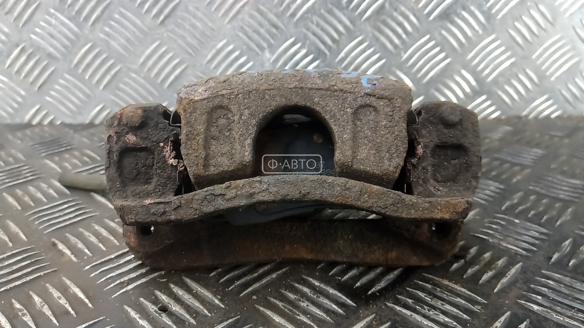 Суппорт тормозной задний левый