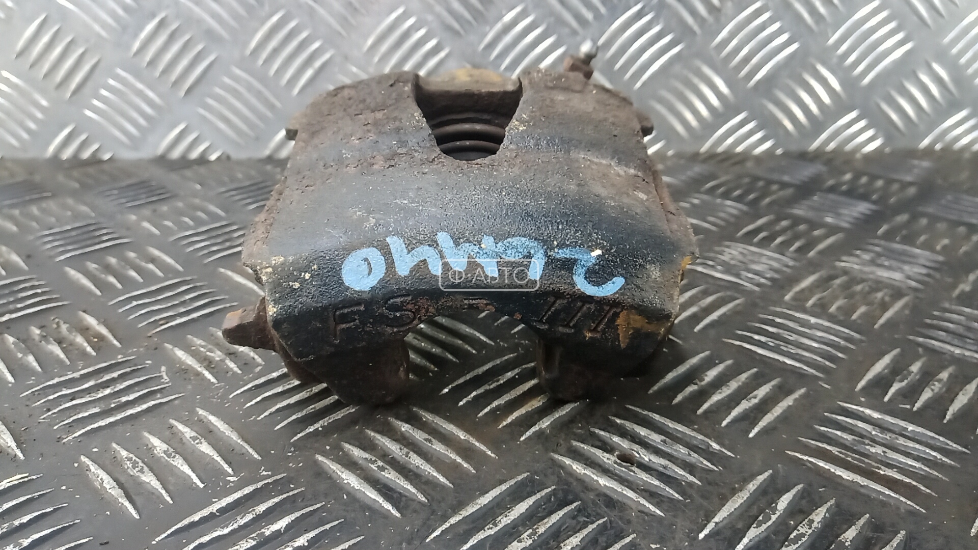 Суппорт тормозной передний левый