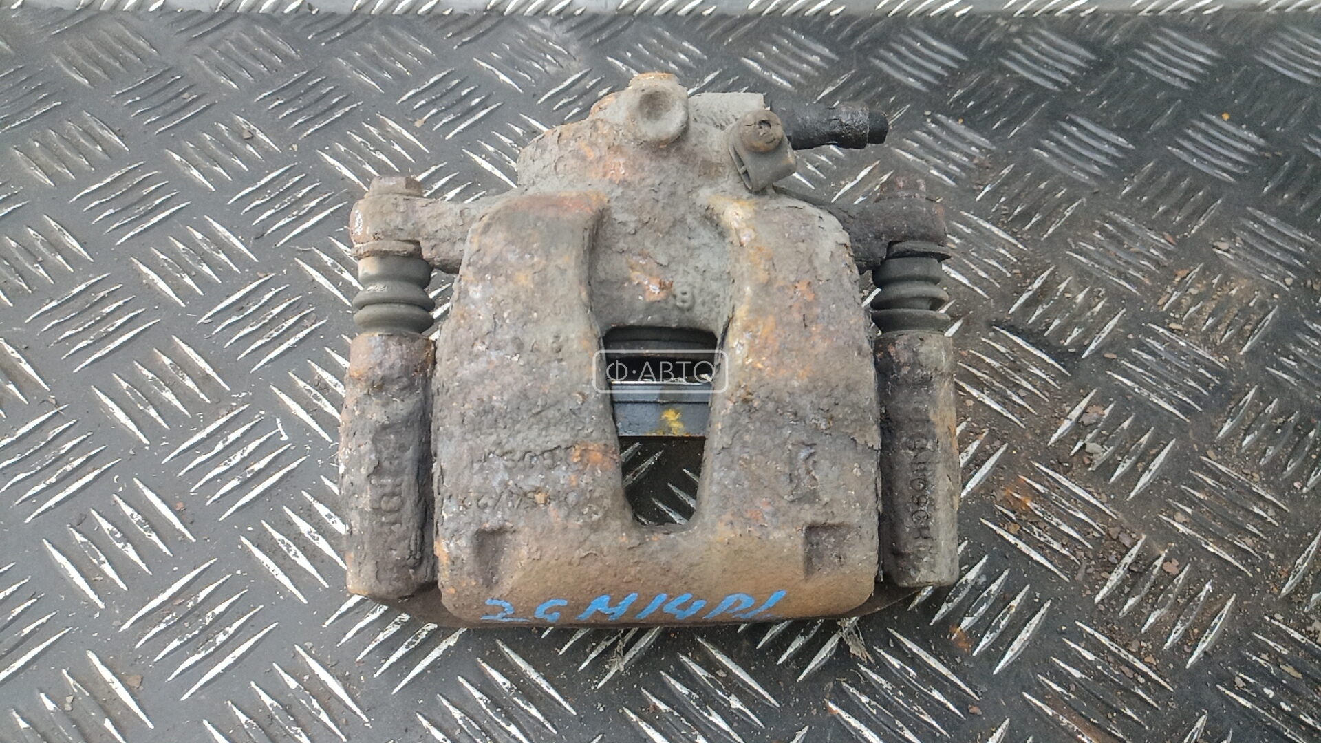 Суппорт тормозной передний левый