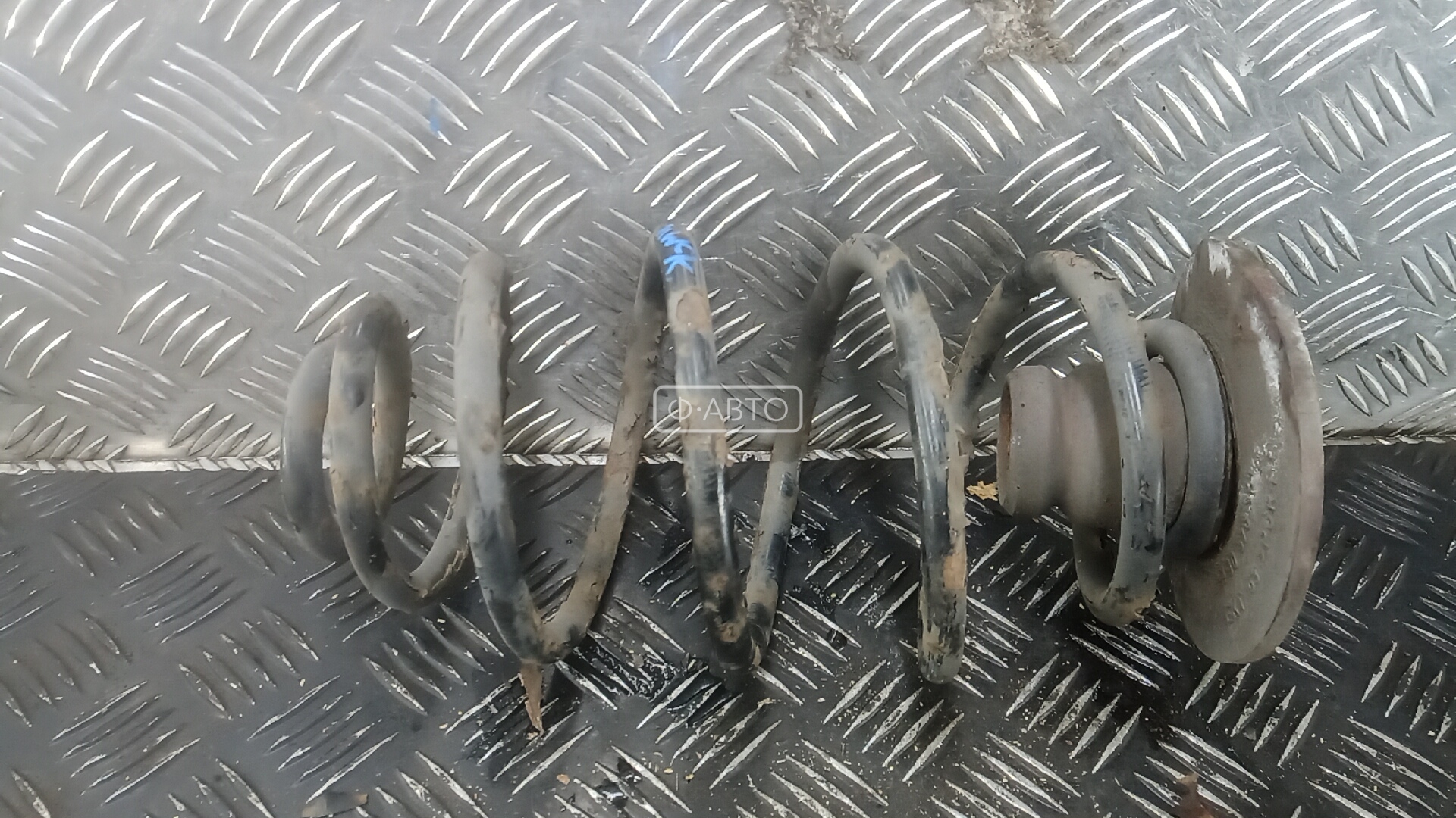 Пружина задняя