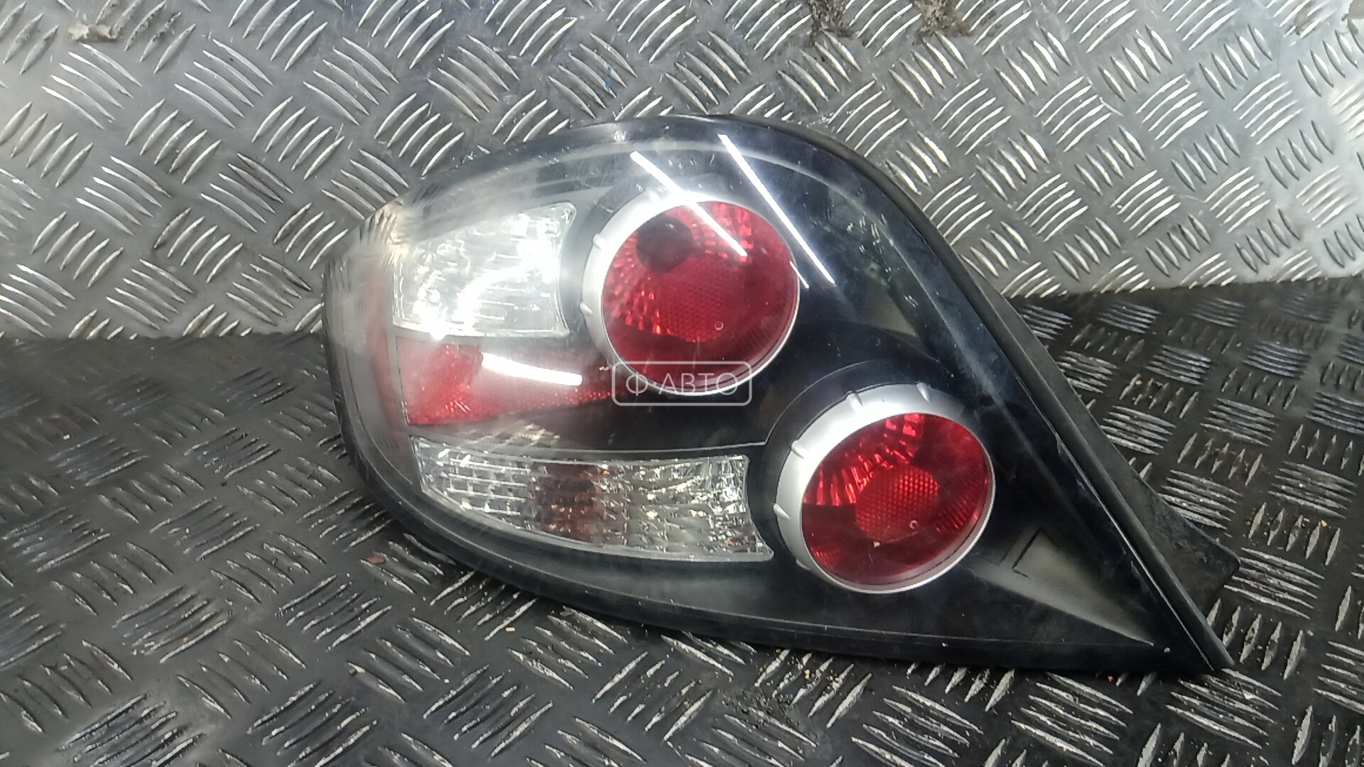 Фонарь задний левый