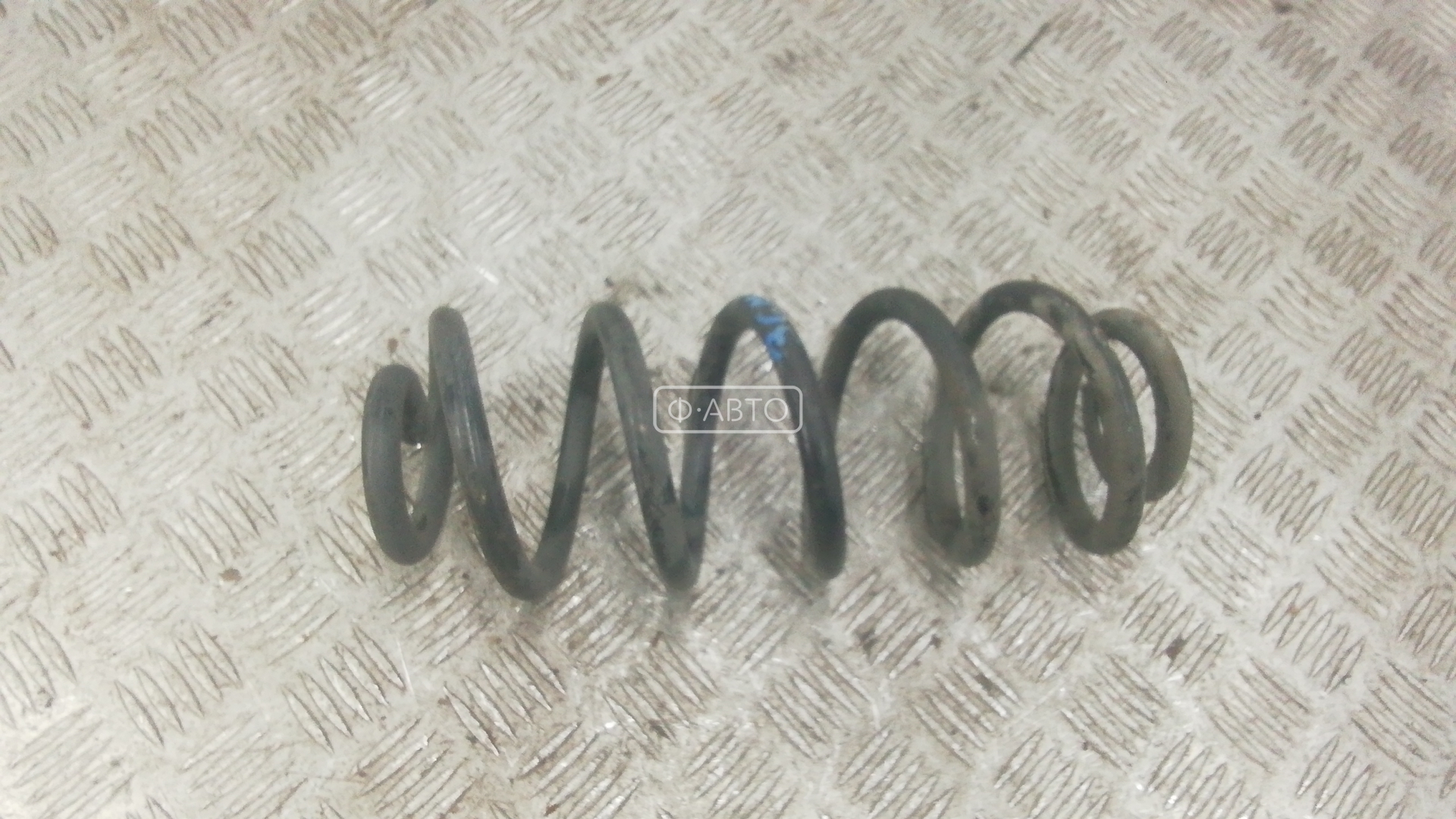 Пружина задняя