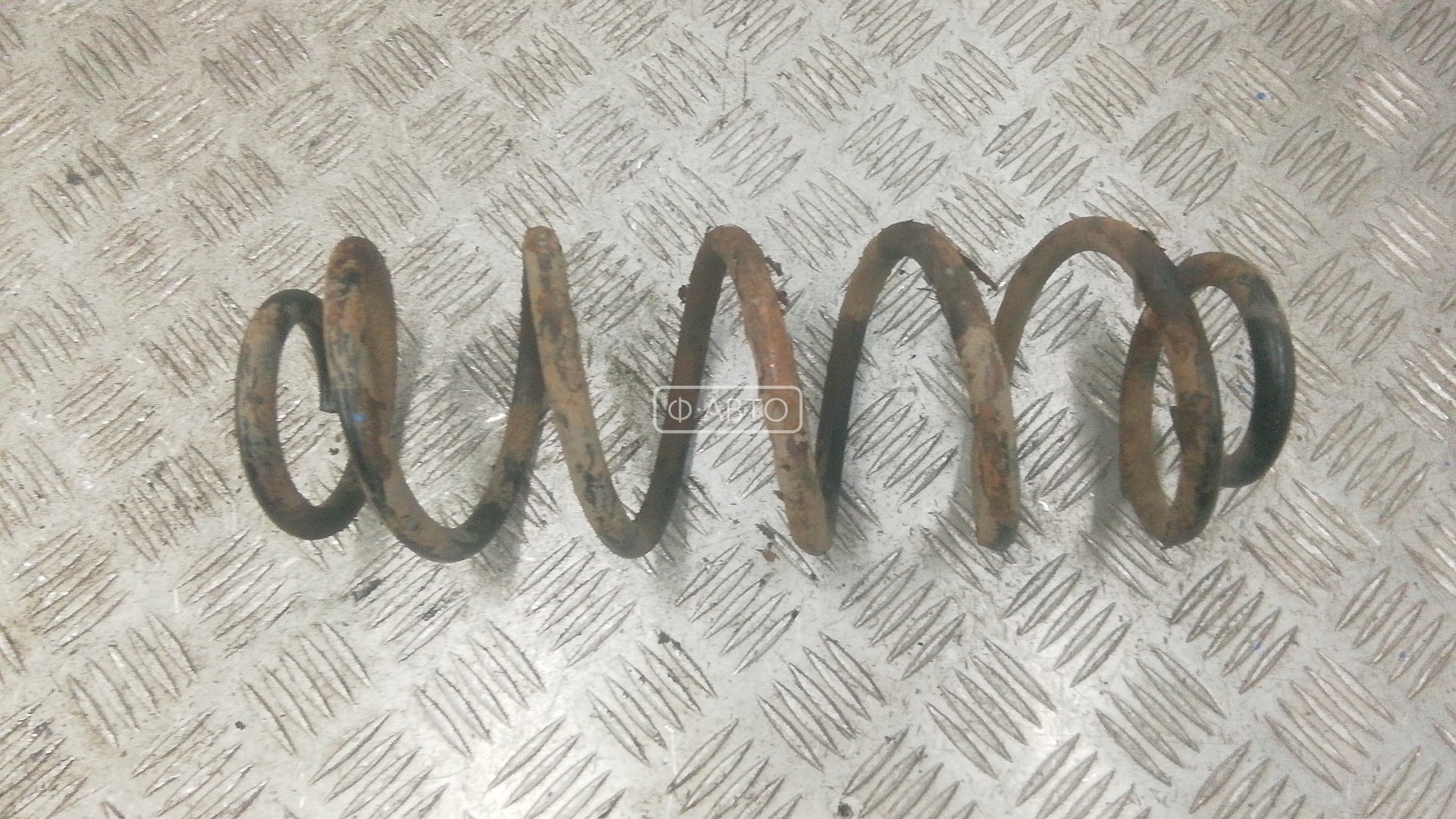 Пружина задняя