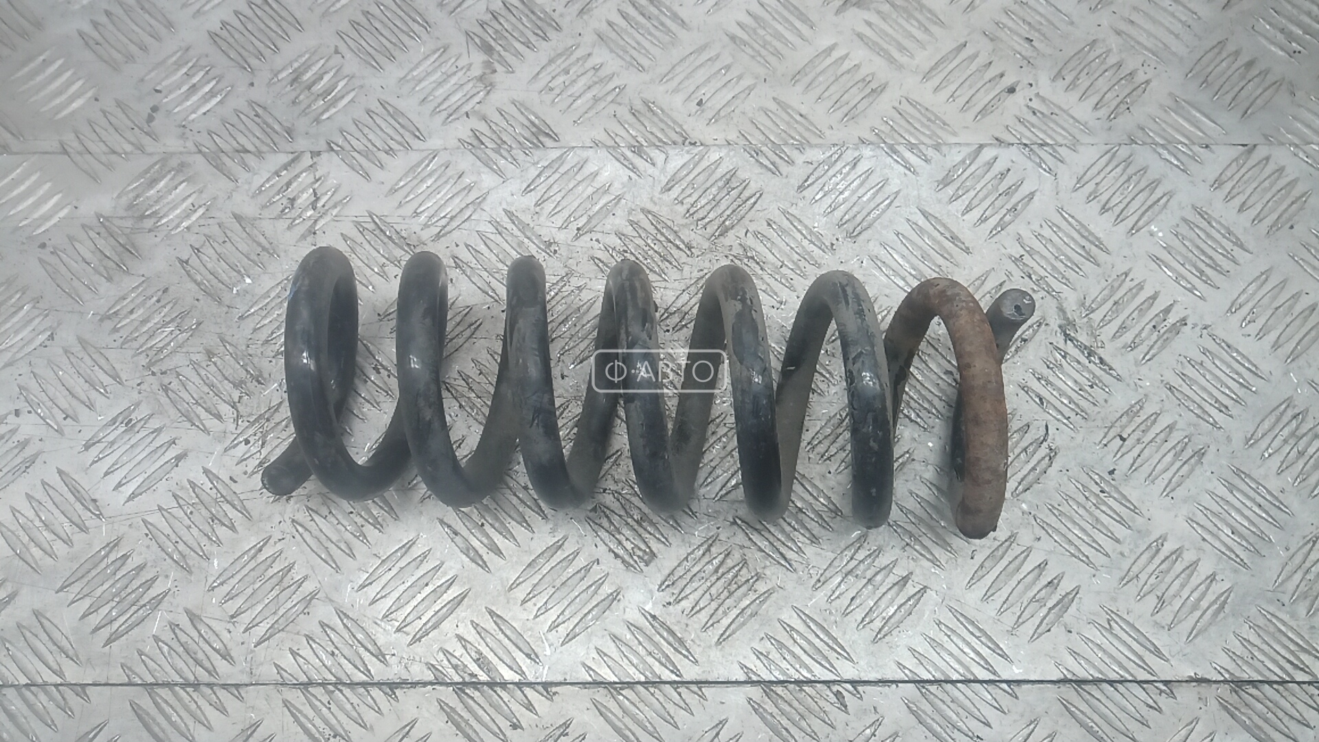 Пружина задняя