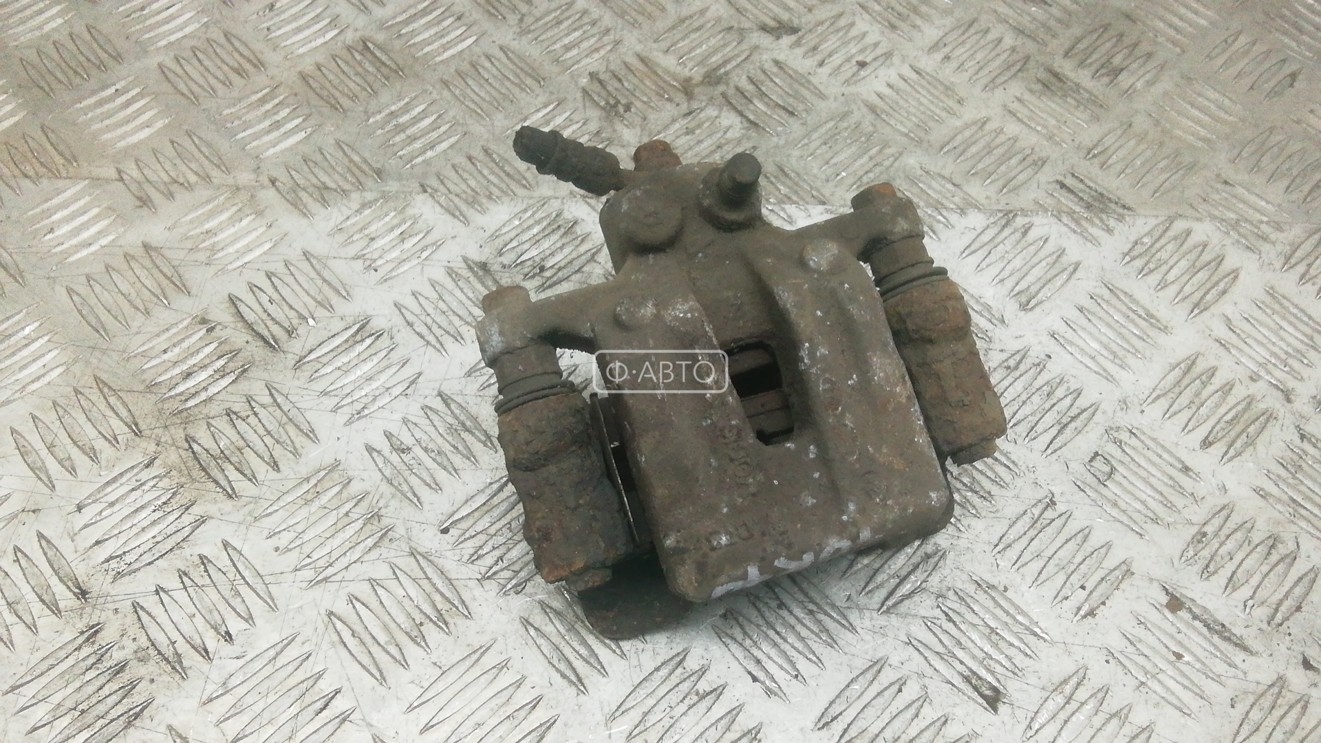 Суппорт тормозной задний правый