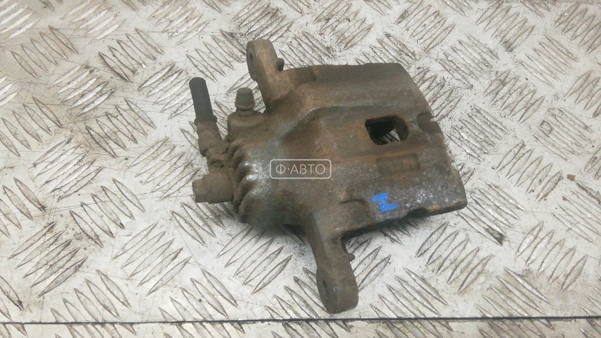 Суппорт тормозной задний левый