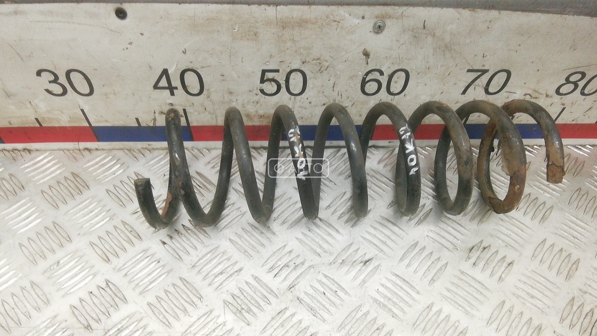 Пружина задняя