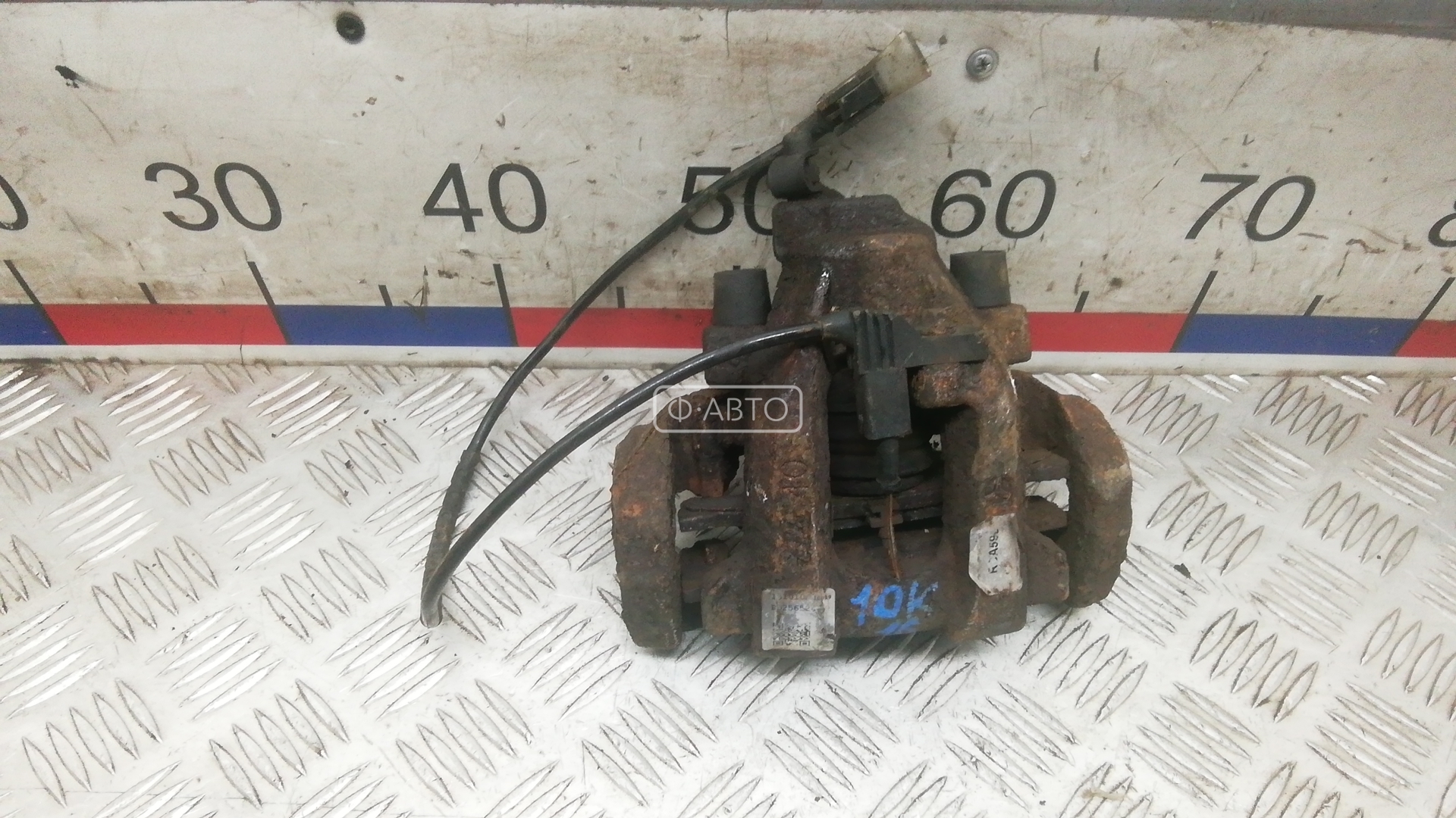 Суппорт тормозной задний левый