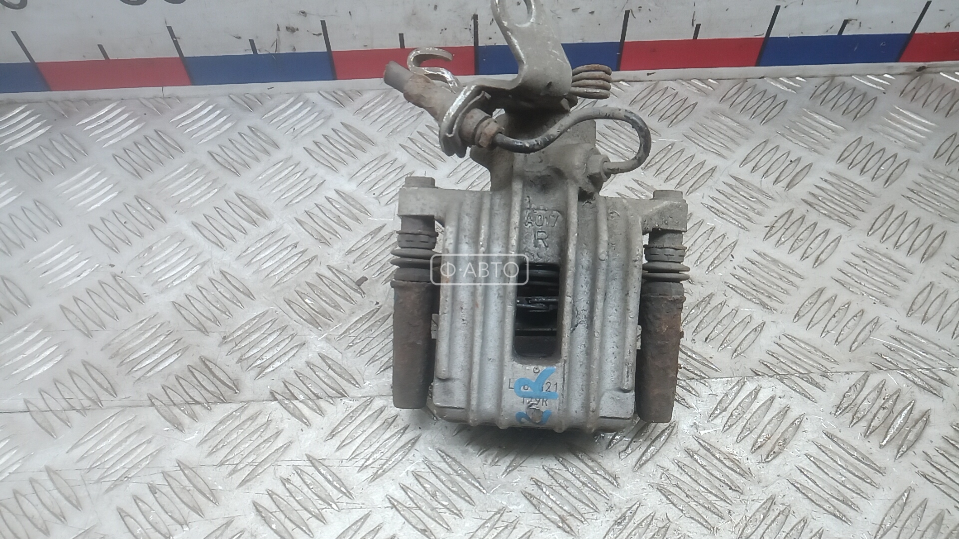 Суппорт тормозной задний правый