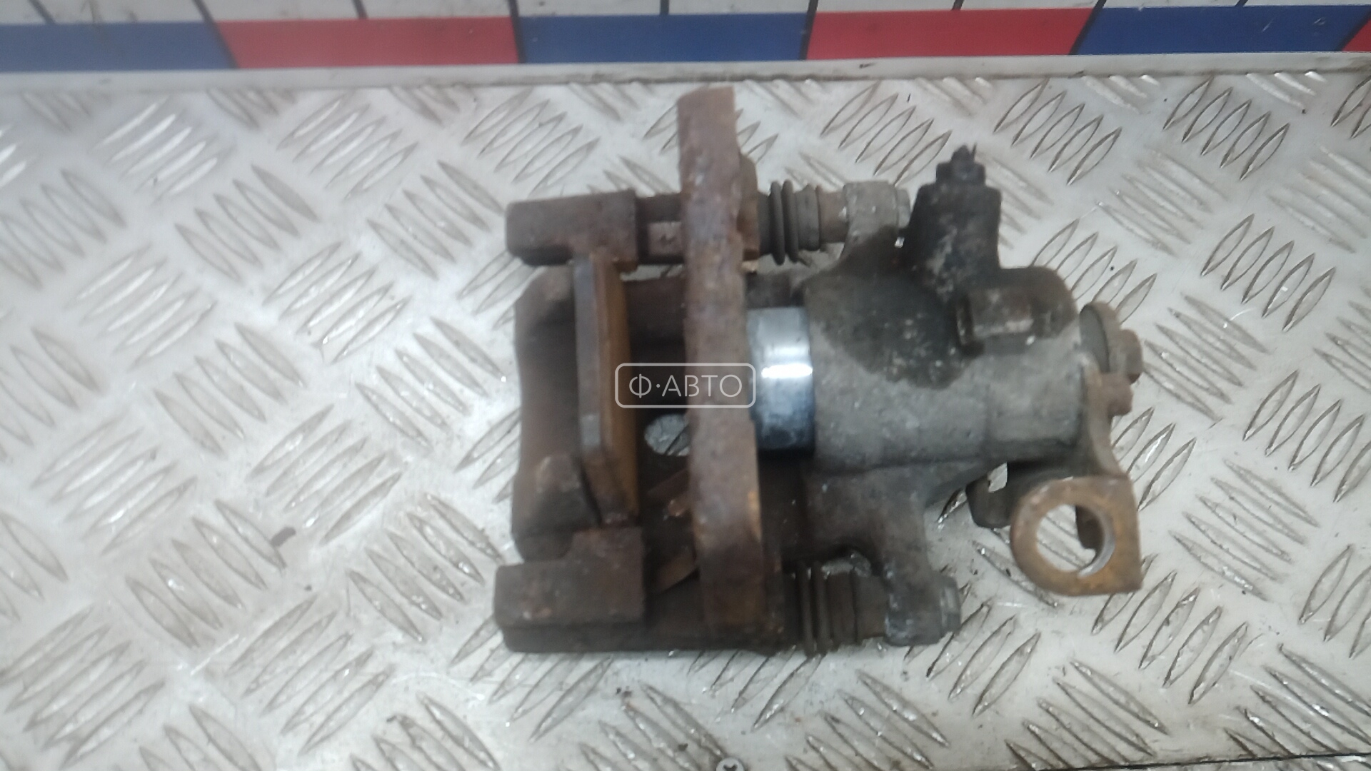 Суппорт тормозной задний правый