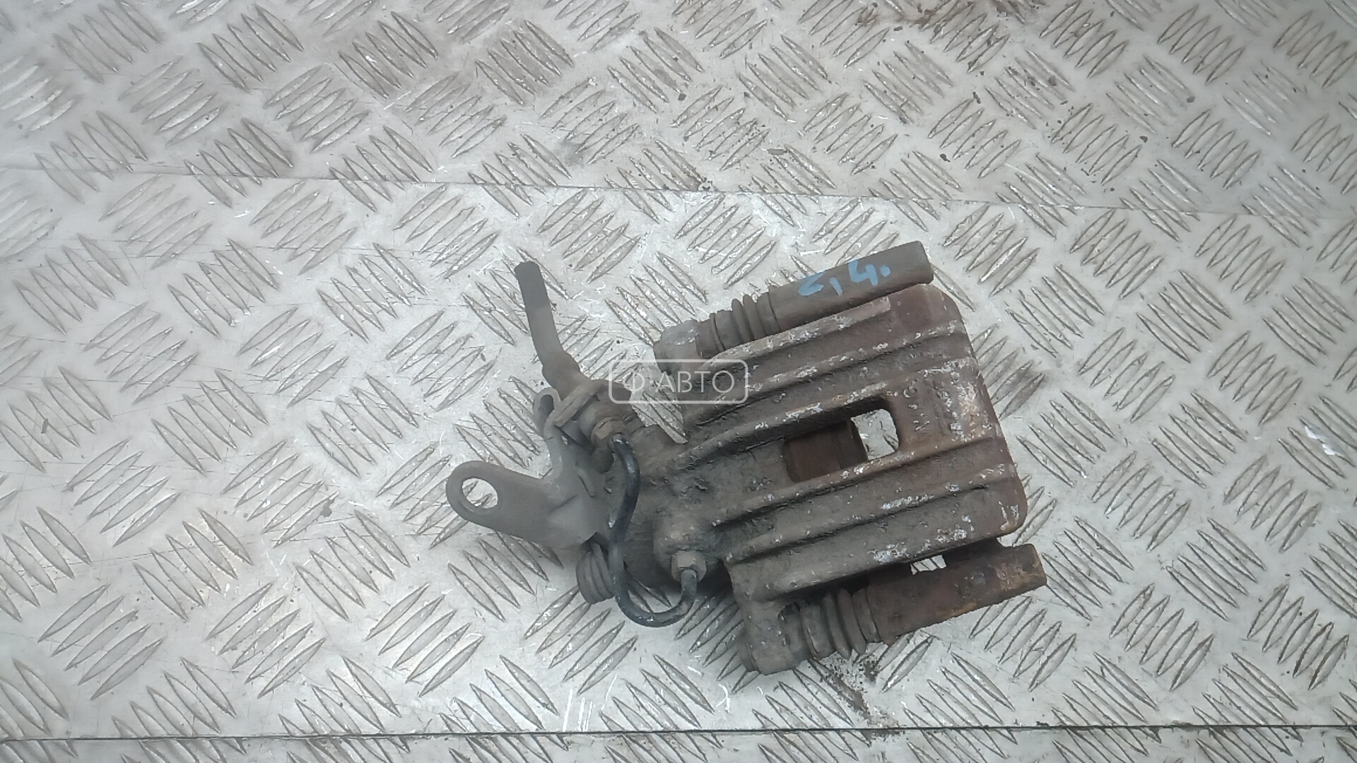 Суппорт тормозной задний левый