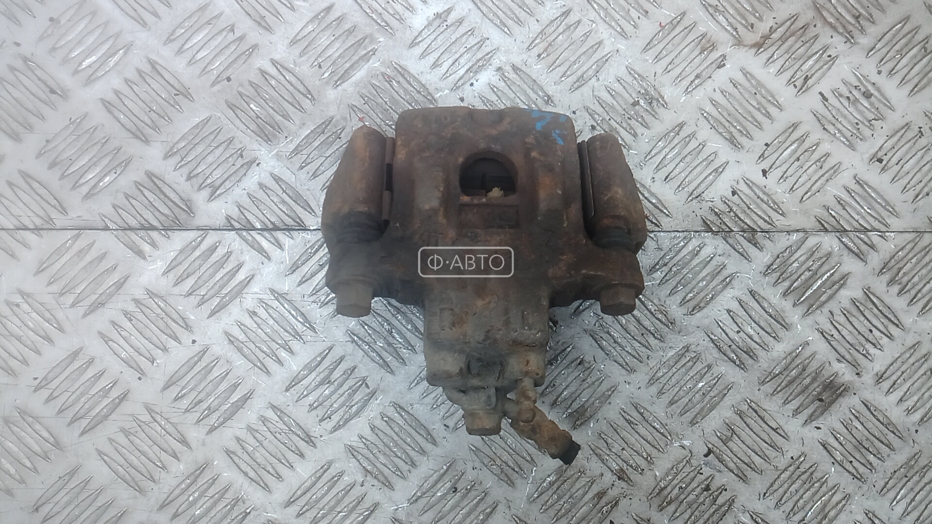 Суппорт тормозной задний левый