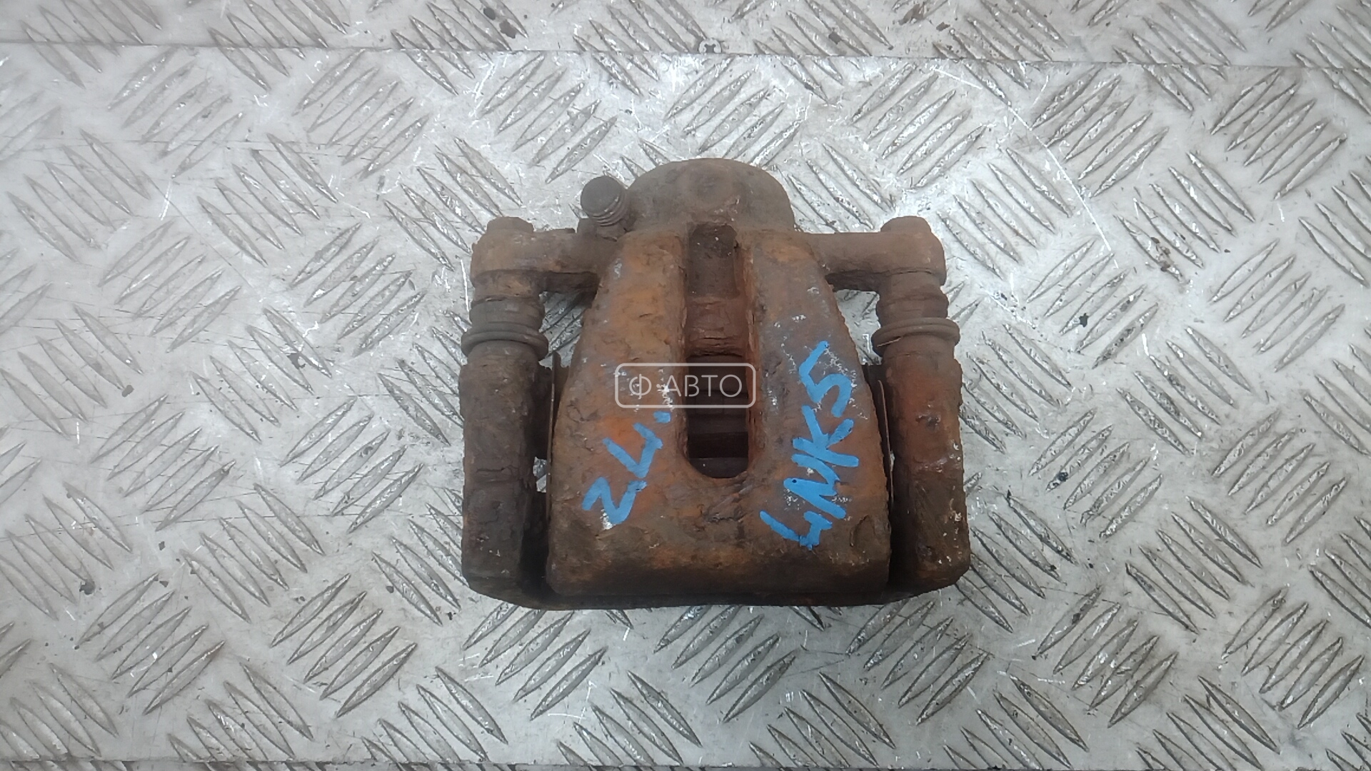 Суппорт тормозной задний левый