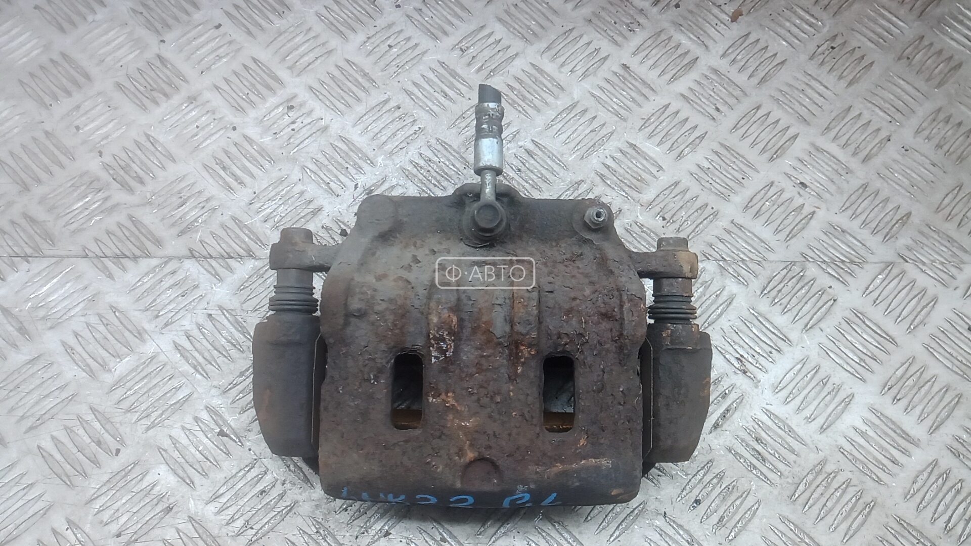 Суппорт тормозной передний левый