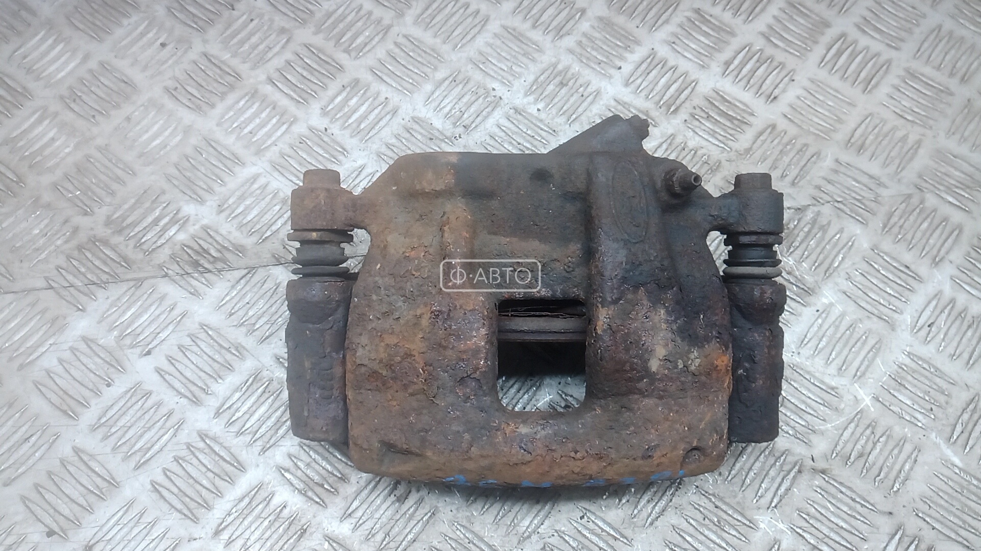 Суппорт тормозной передний левый