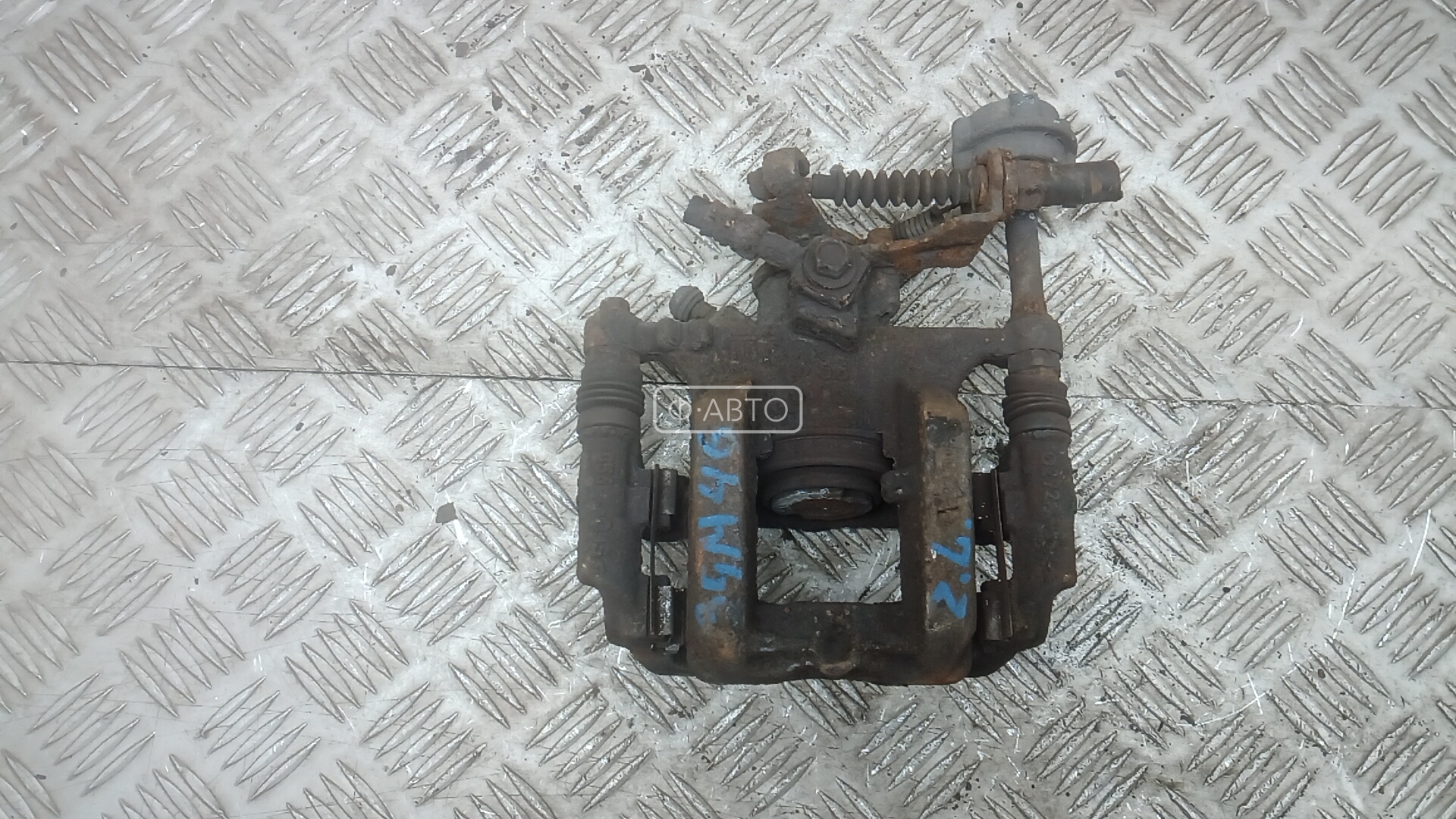 Суппорт тормозной задний левый