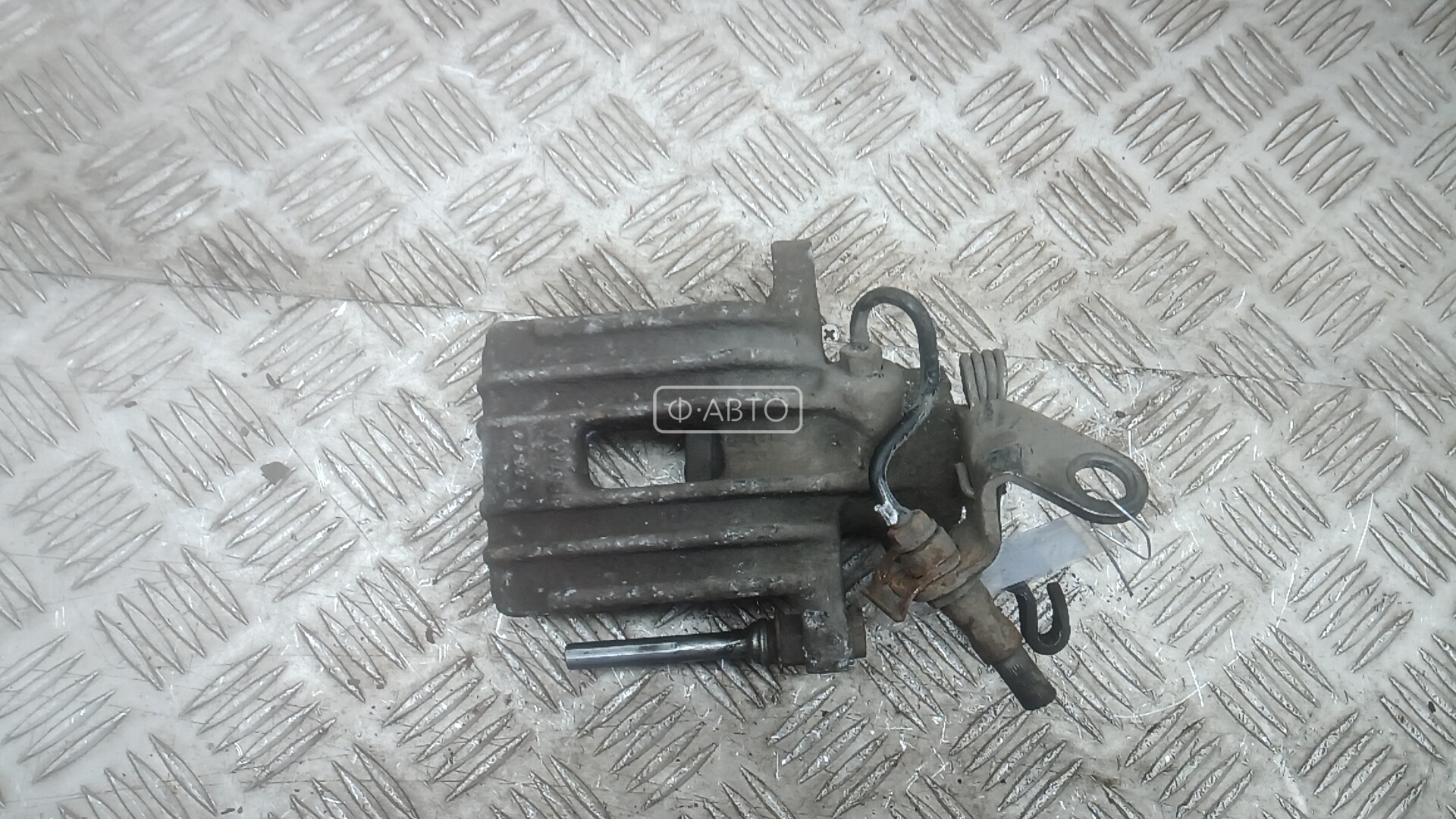 Суппорт тормозной задний левый