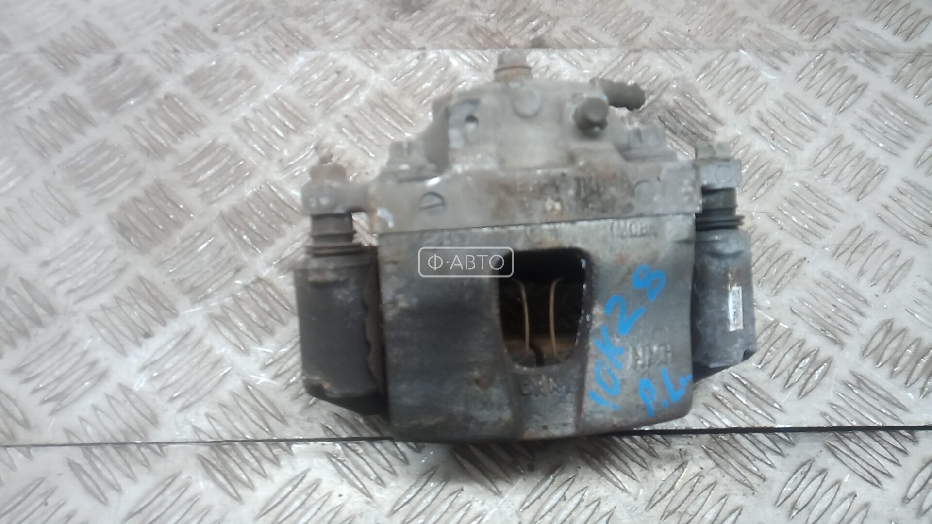 Суппорт тормозной передний левый