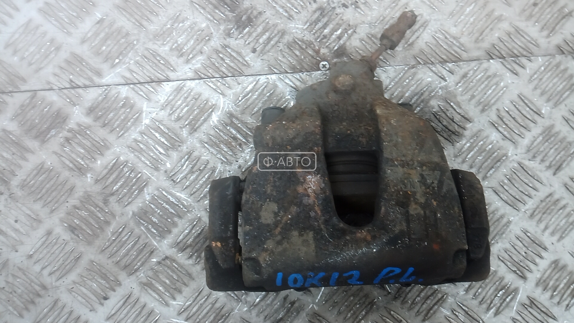 Суппорт тормозной передний левый