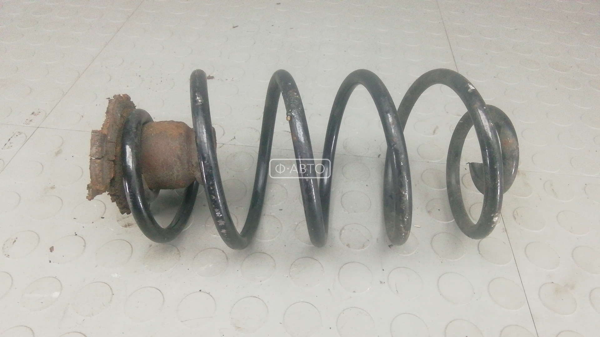 Пружина задняя