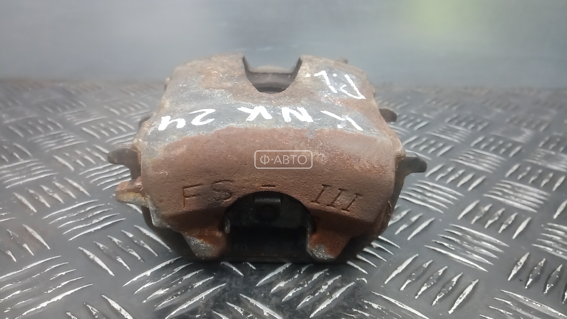 Суппорт тормозной передний левый