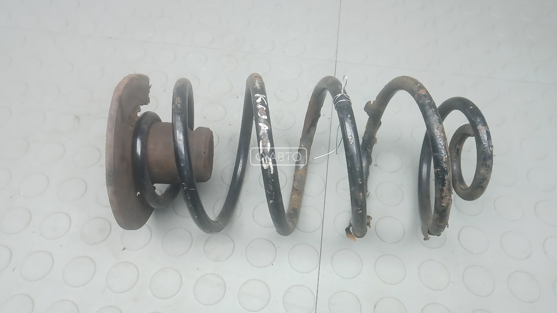 Пружина задняя