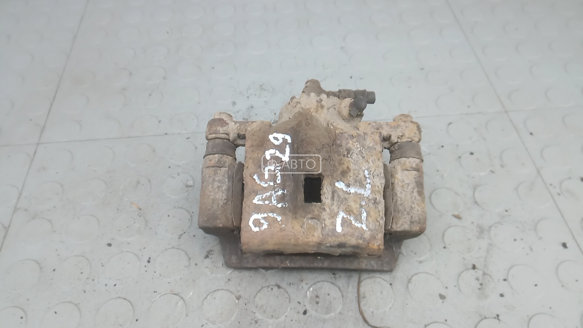 Суппорт тормозной задний левый