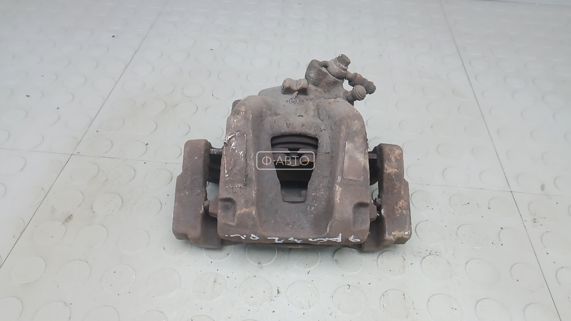 Суппорт тормозной передний левый