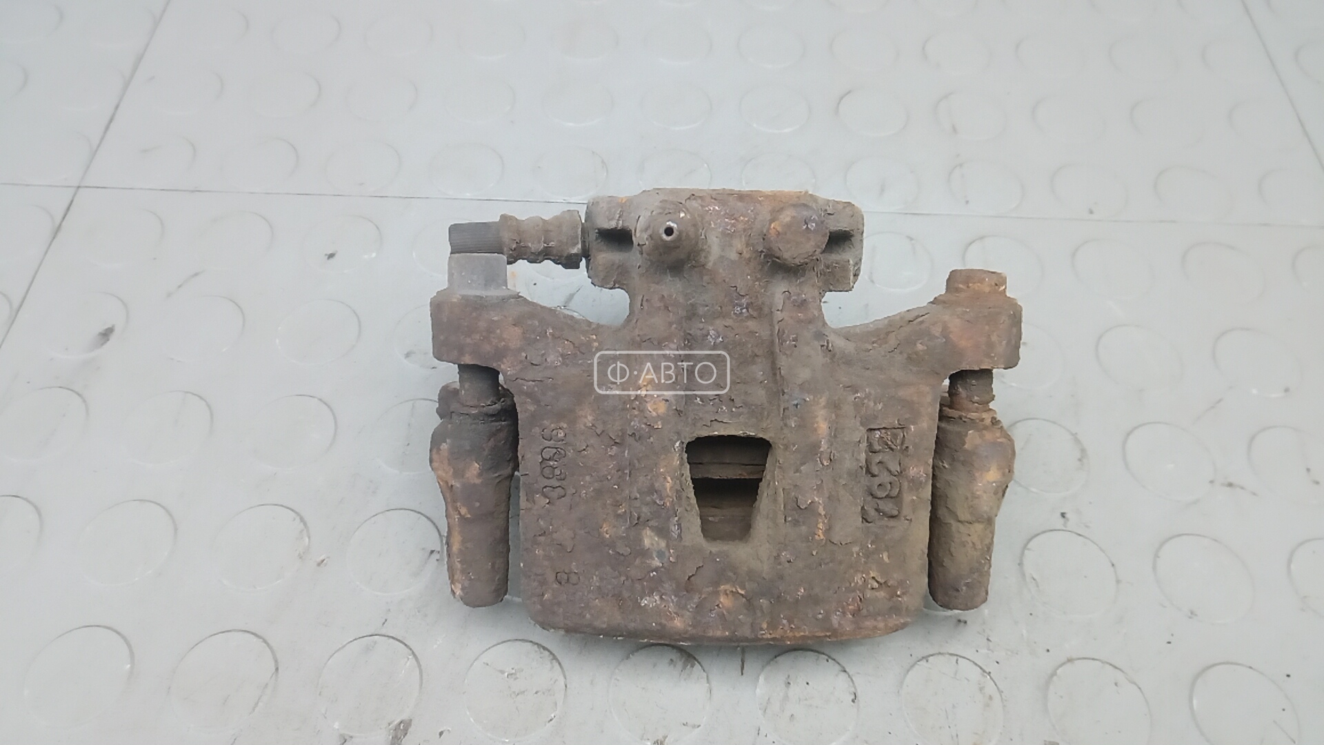 Суппорт тормозной задний левый