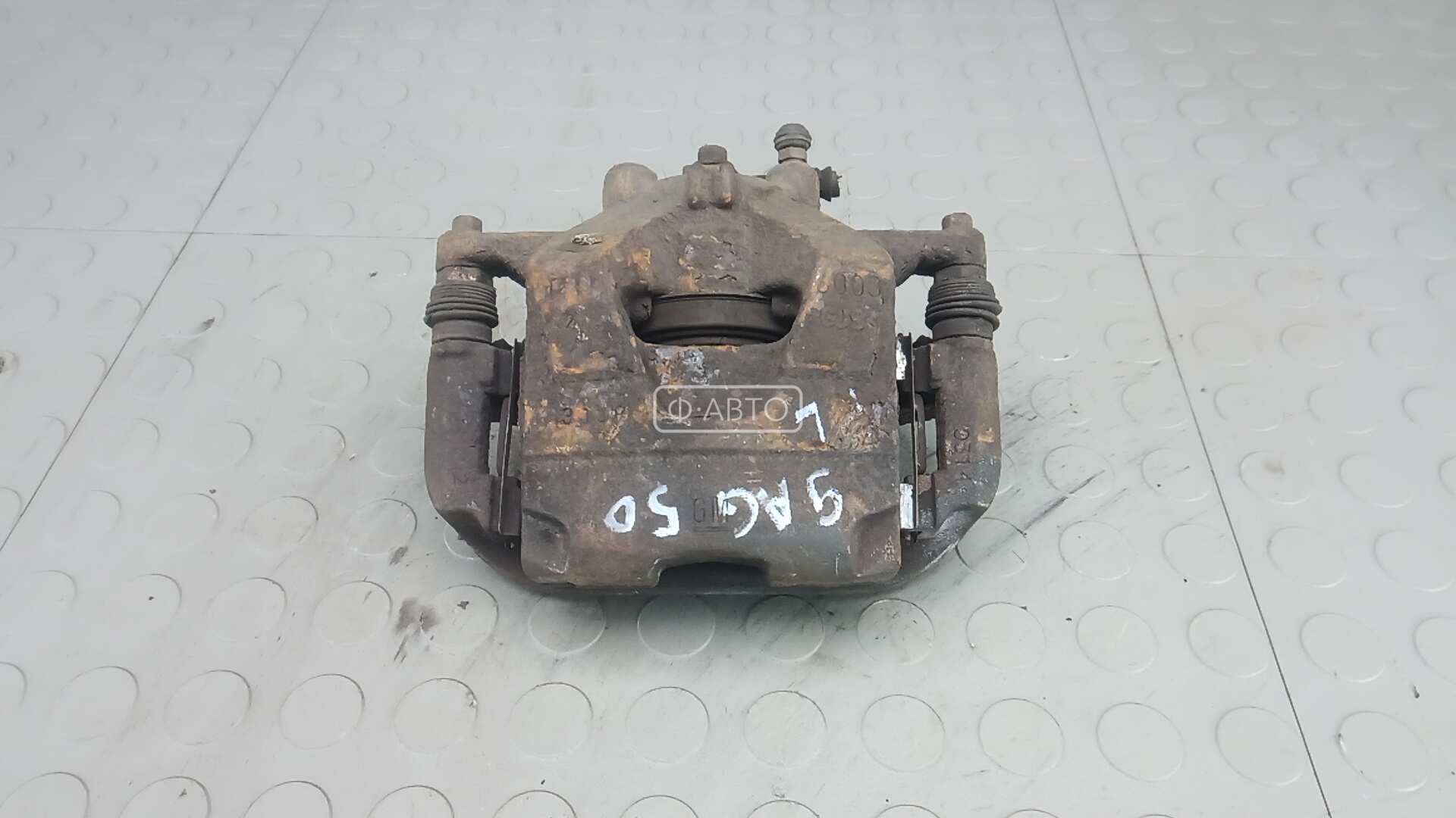 Суппорт тормозной передний левый