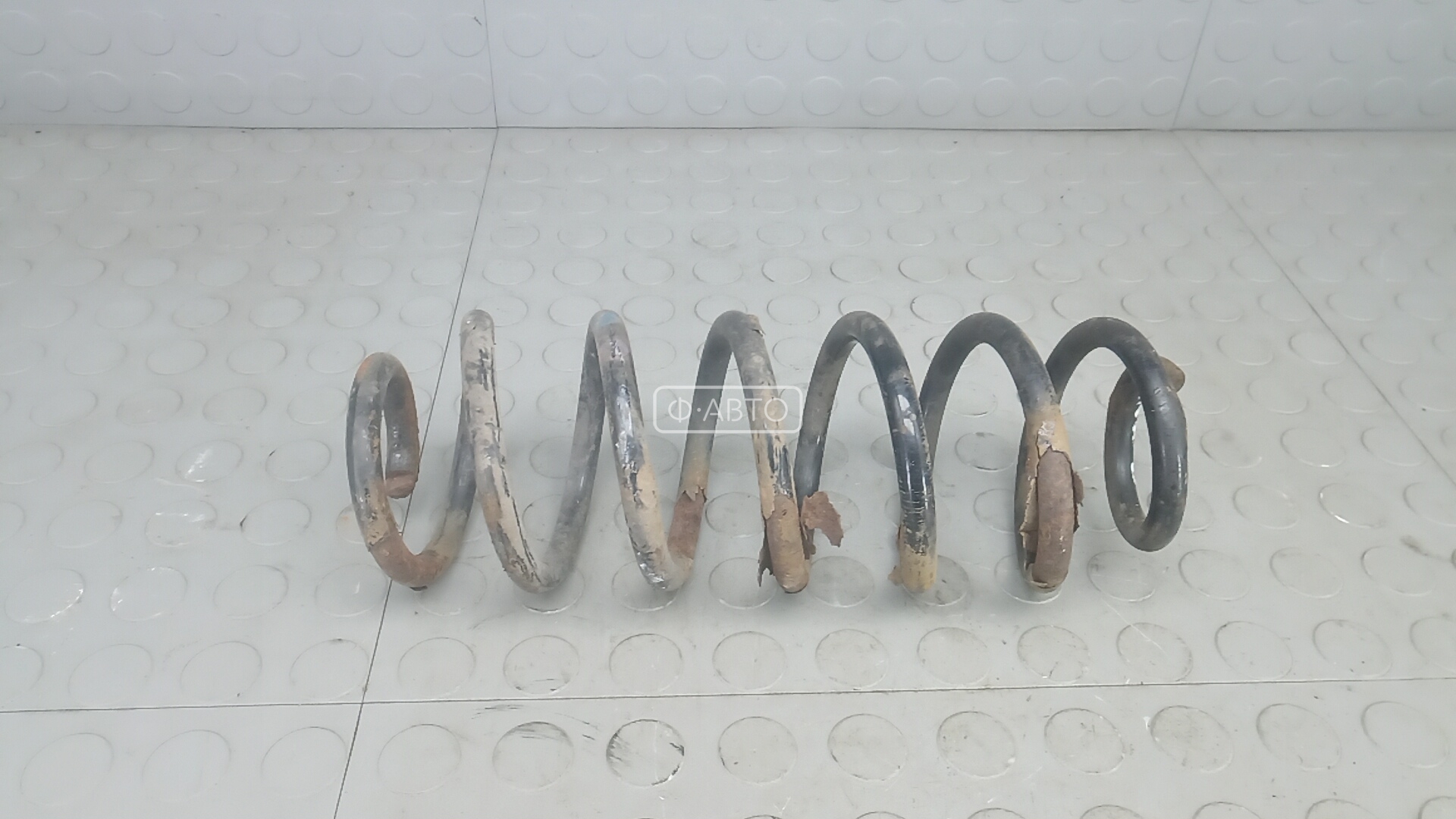 Пружина задняя