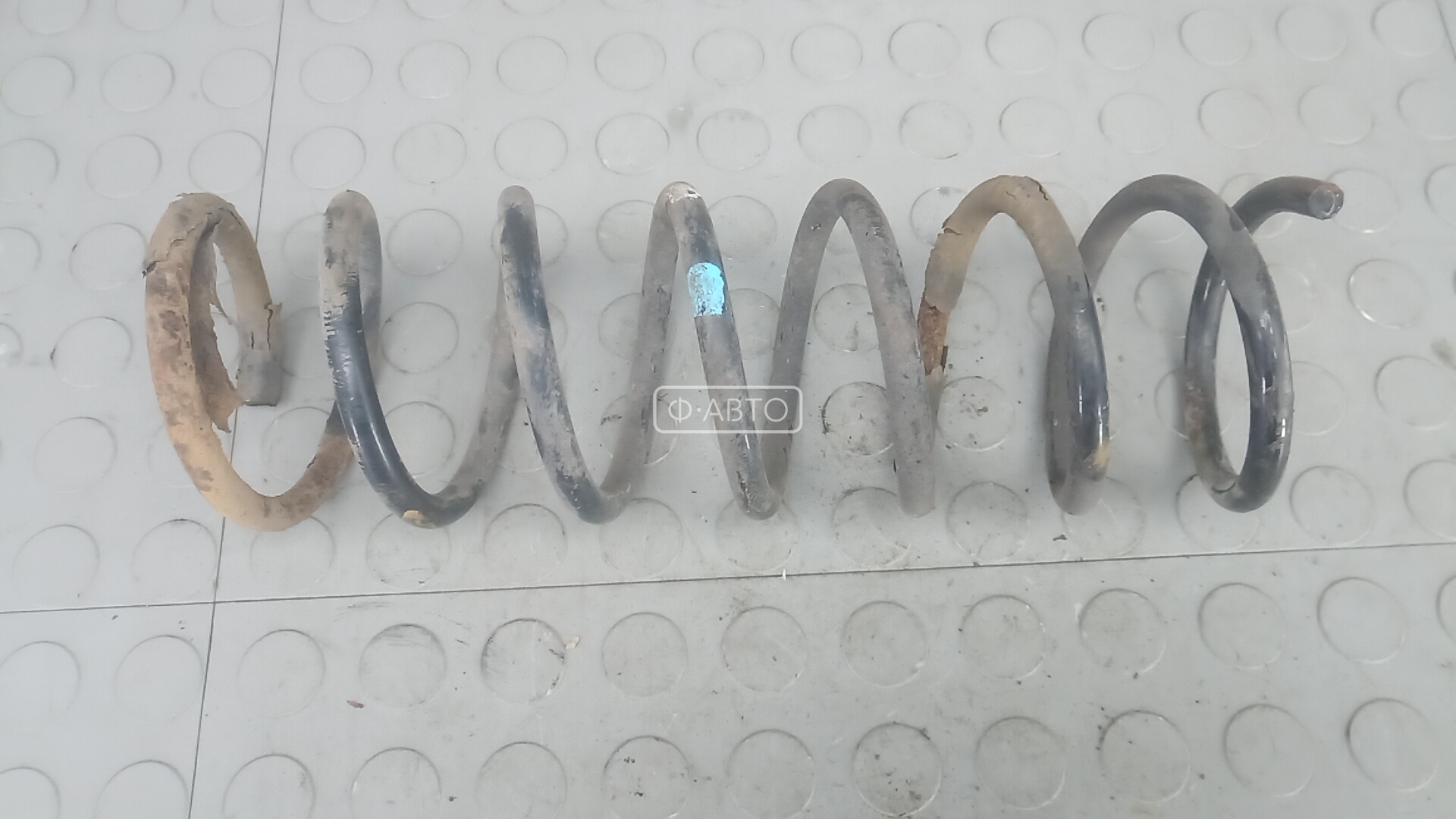 Пружина задняя