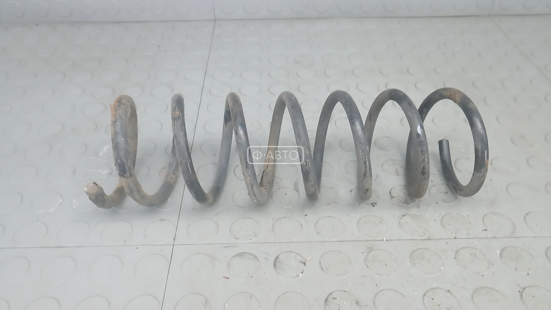 Пружина задняя