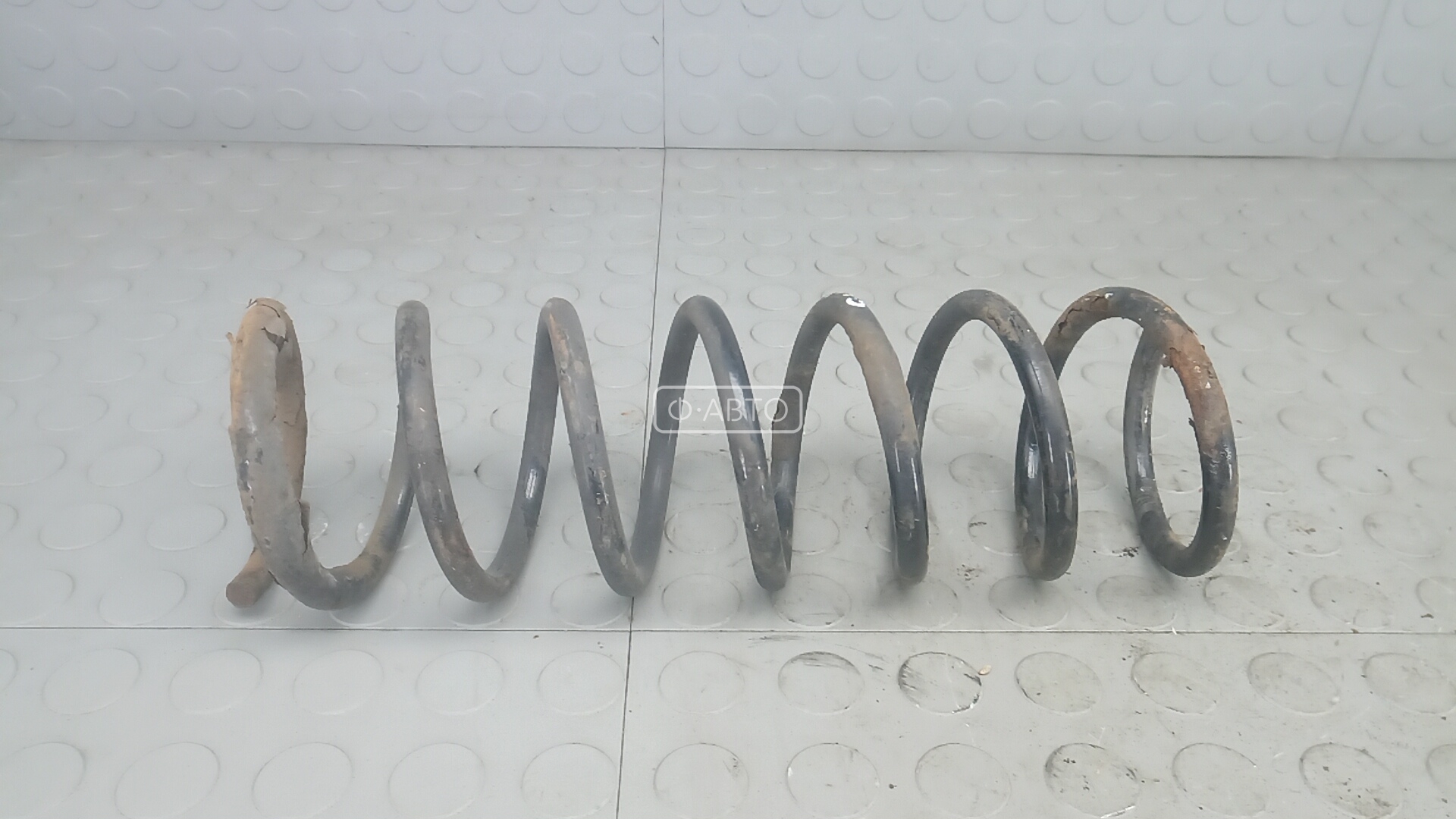 Пружина задняя