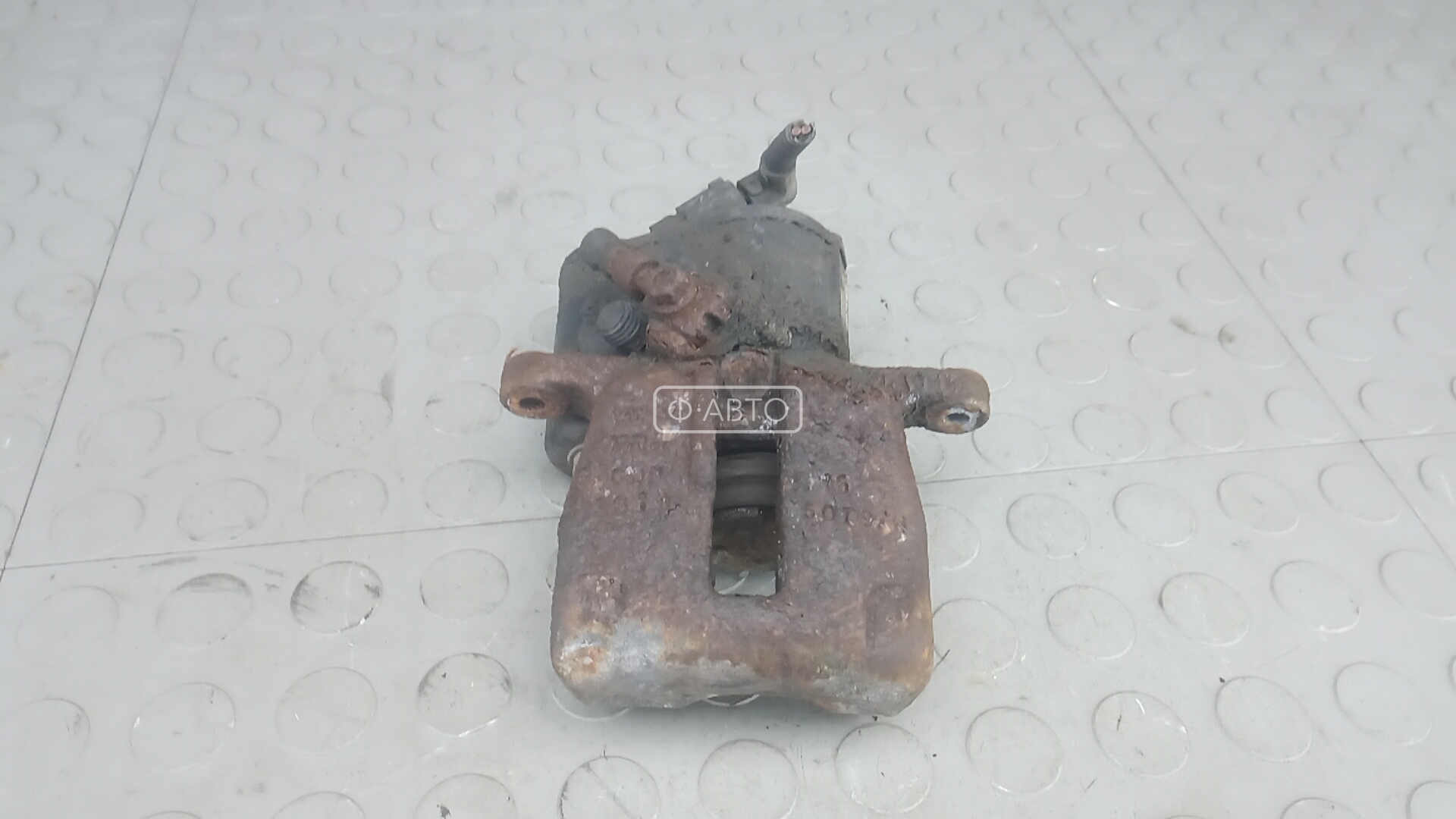 Суппорт тормозной задний правый