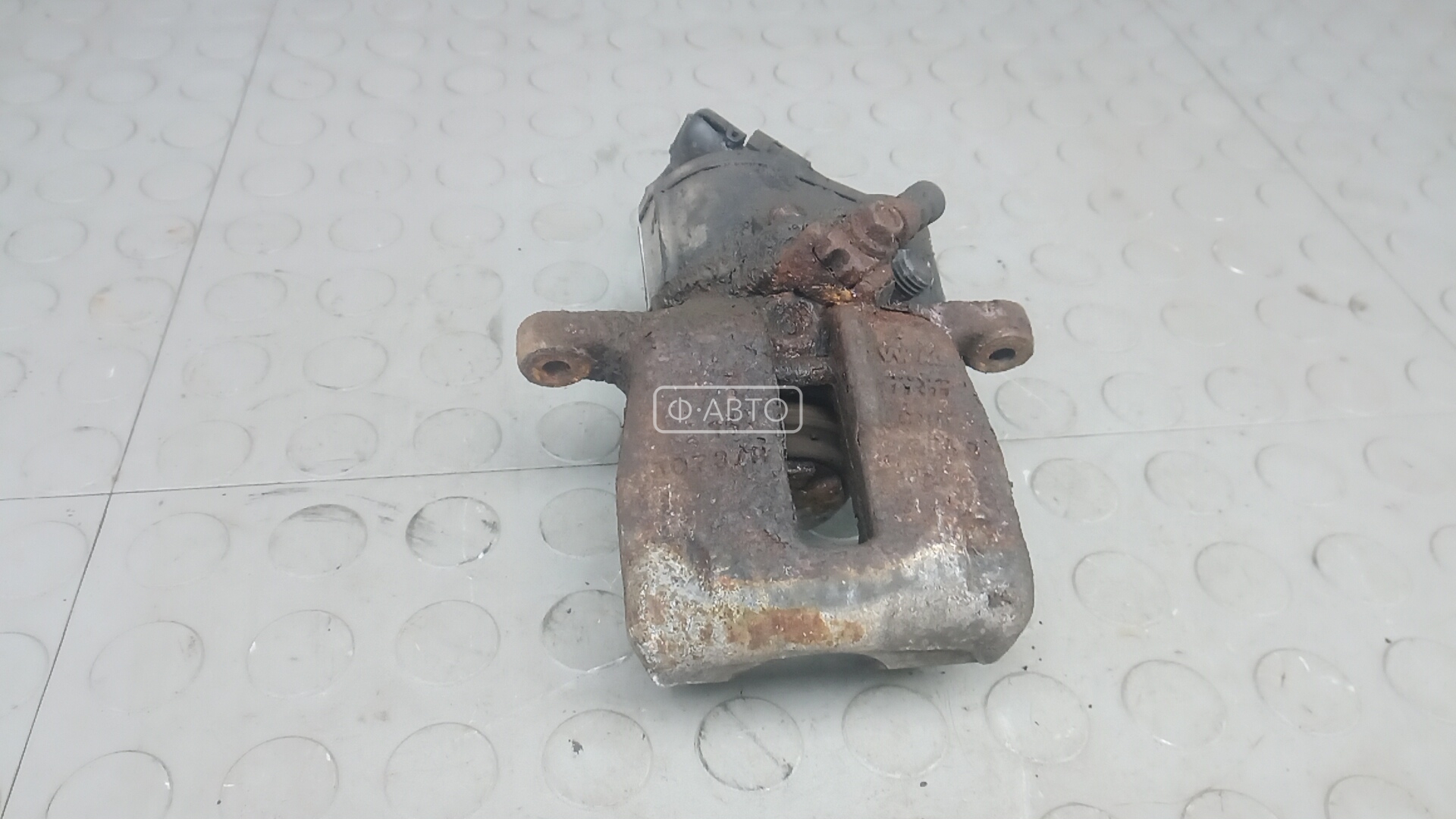 Суппорт тормозной задний левый