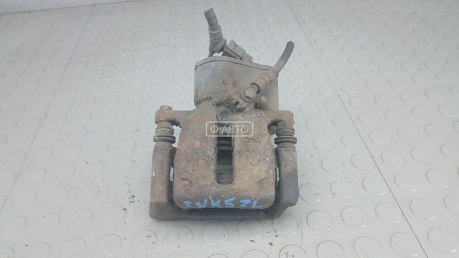 Суппорт тормозной задний левый