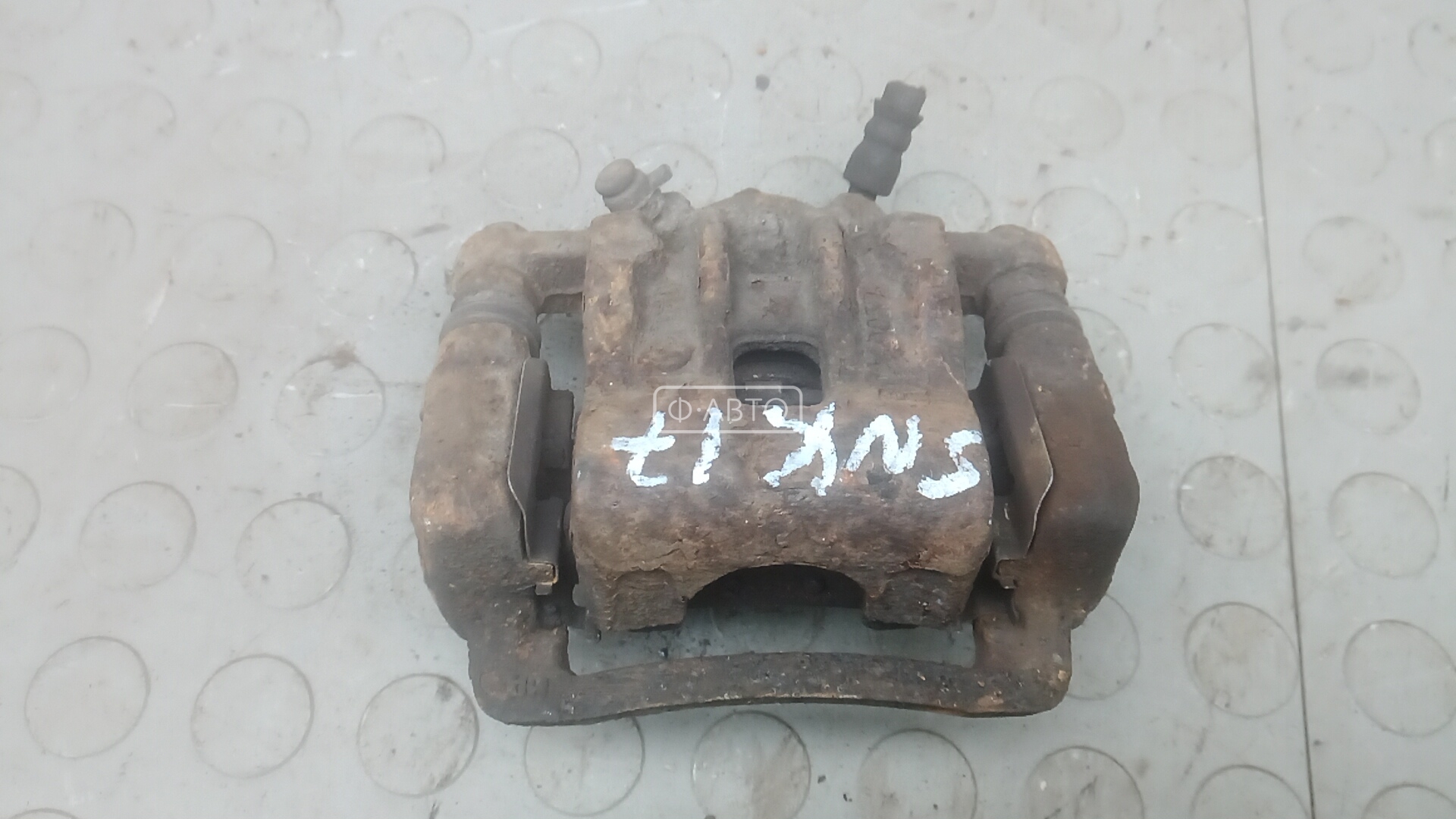 Суппорт тормозной задний левый