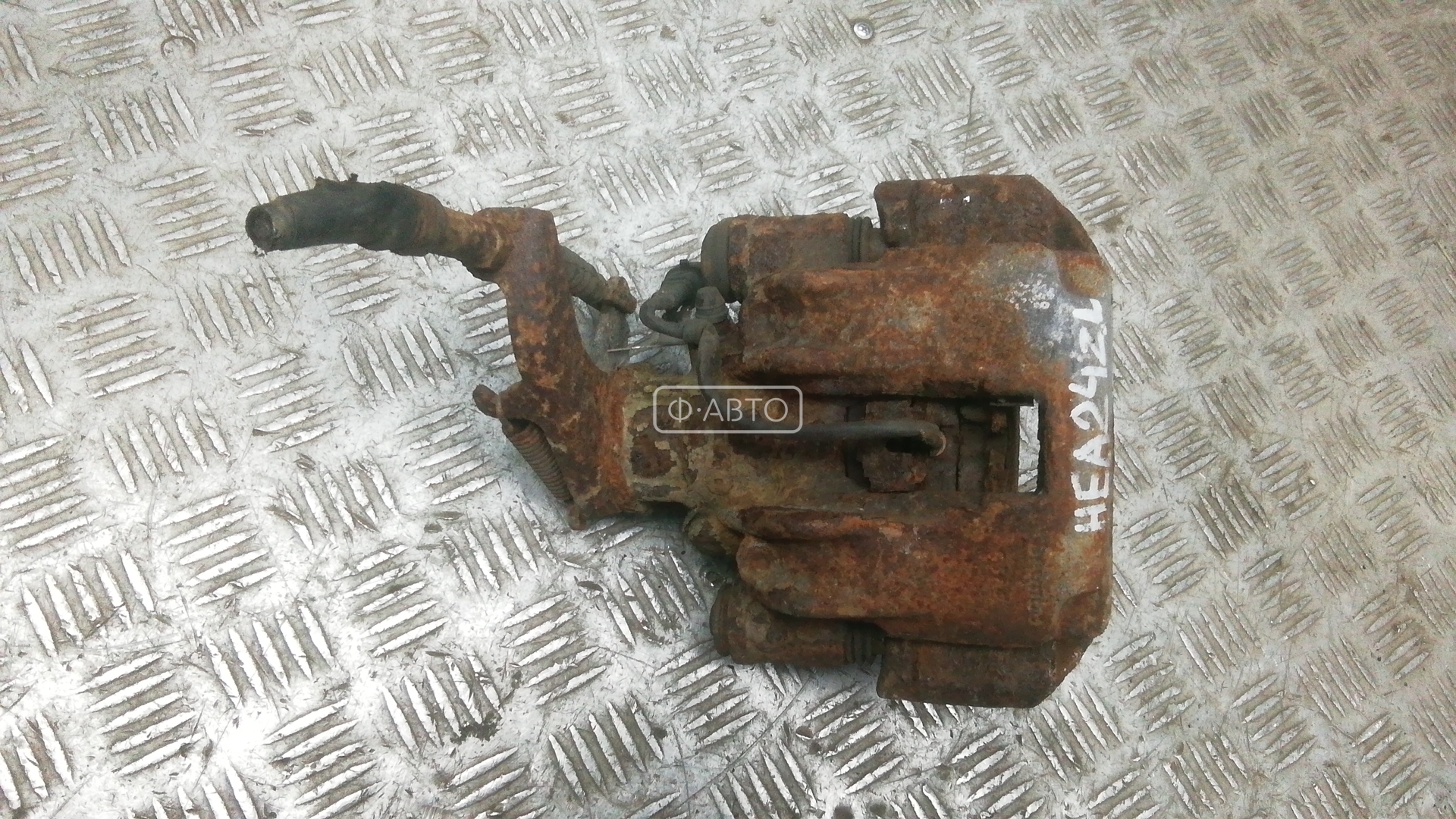 Суппорт тормозной задний левый