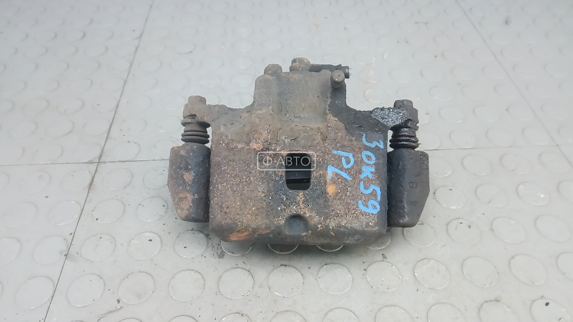 Суппорт тормозной передний левый