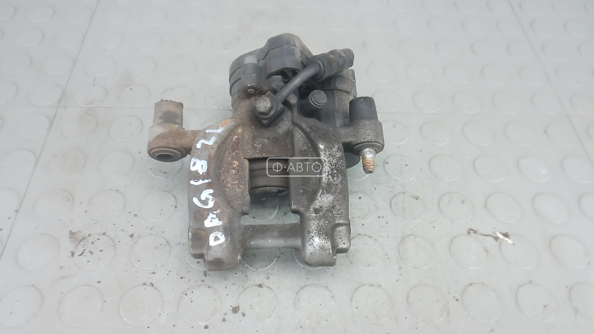 Суппорт тормозной задний левый