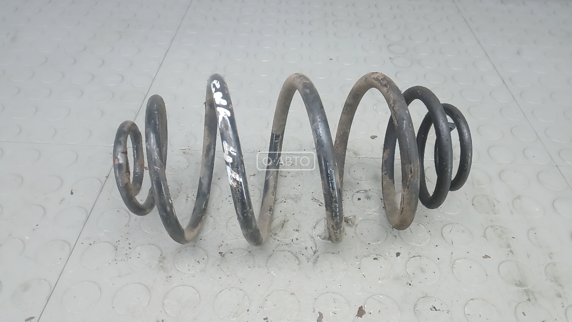 Пружина задняя